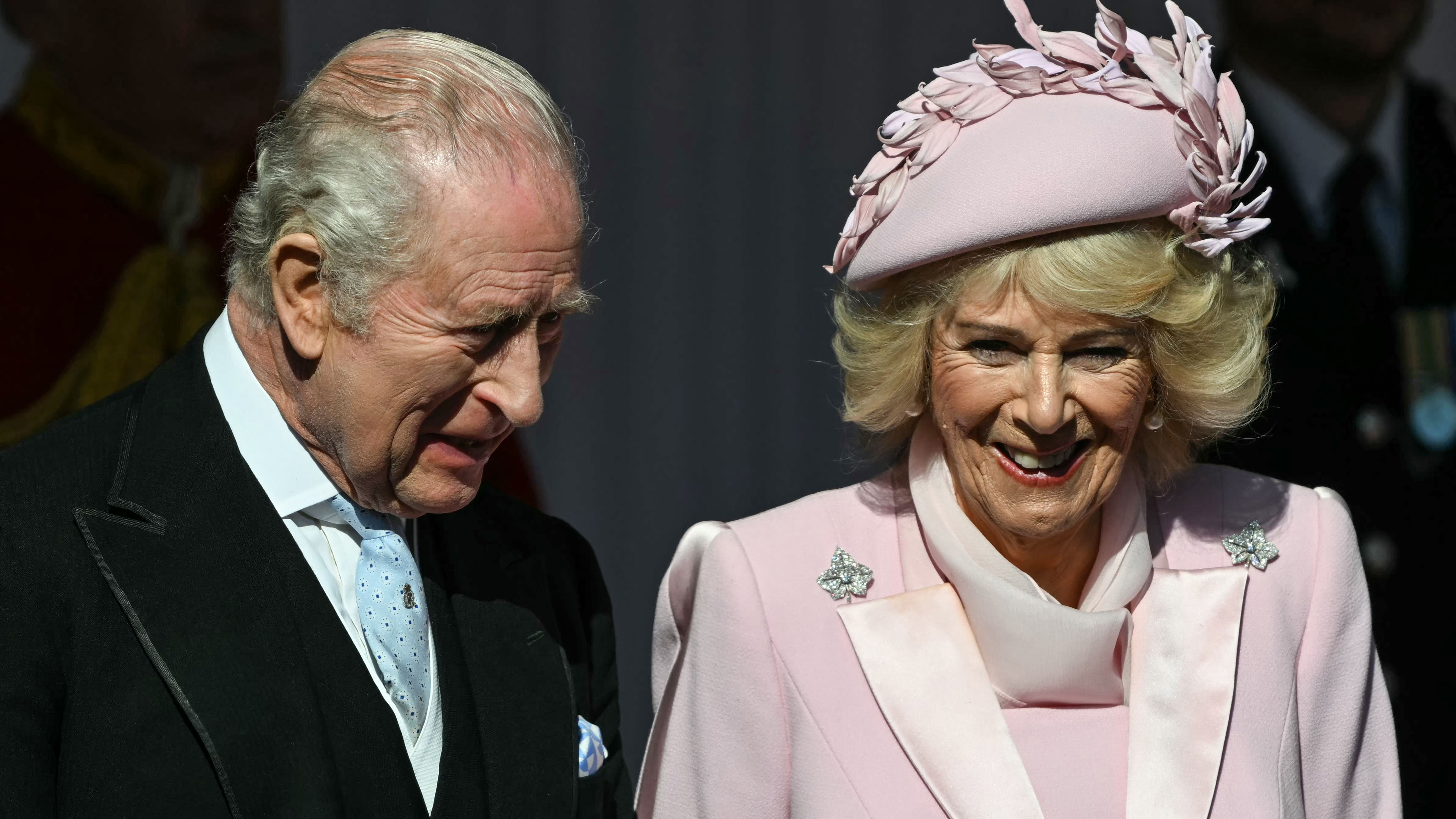 Britain's King Charles and Queen Camilla wait at Datchet Road to greet Nigerian President Bola Ahmed Tinubu, and his wife ahead of a carriage procession to Windsor Castle, in Windsor, England, Wednesday, March 18, 2026. 
