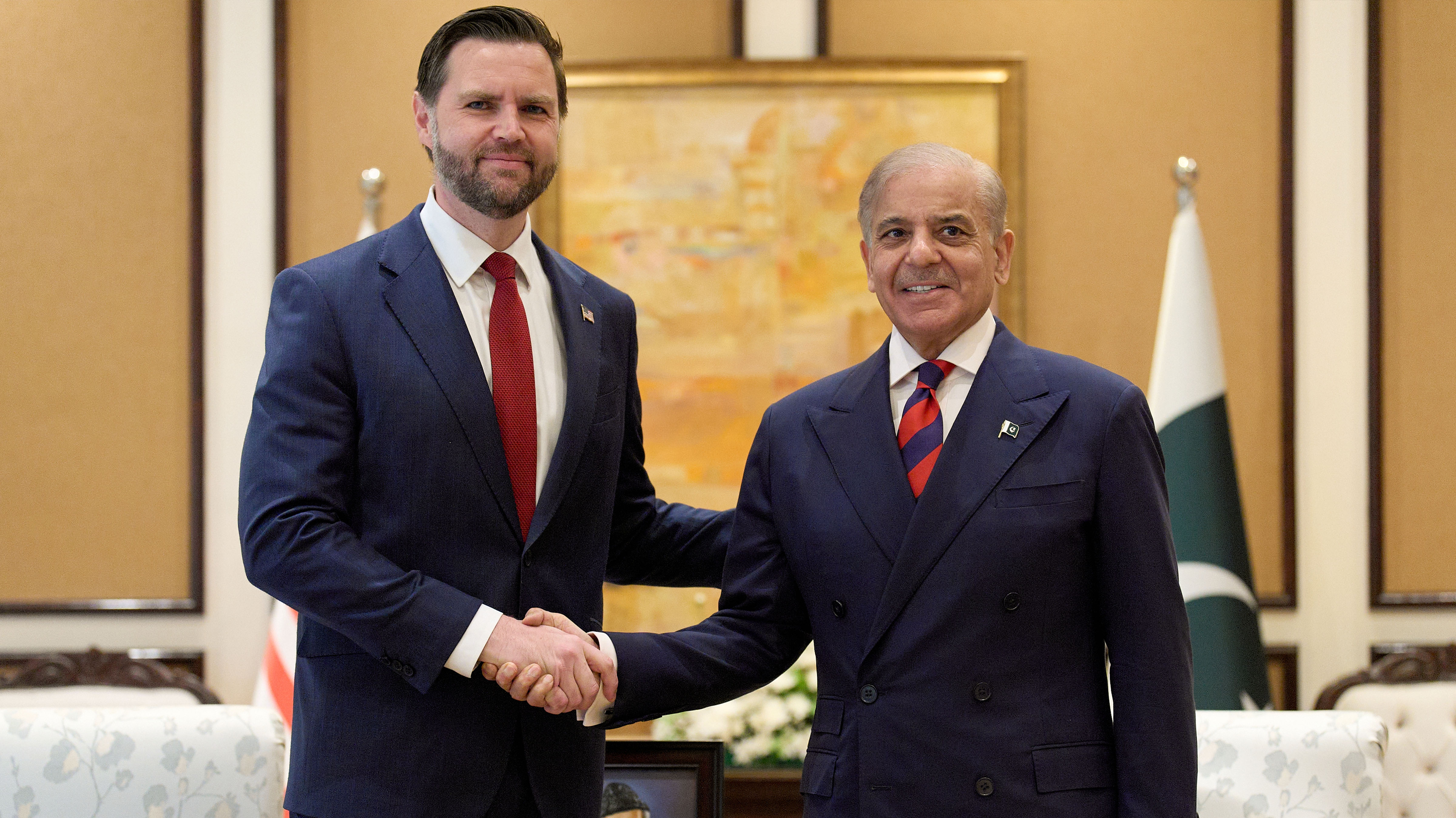 U.S. Vice President JD Vance, left, shakes hands with Pakistan's Prime Minister Shehbaz Sharif, Saturday, April 11, 2026, while meeting in Islamabad for talks about Iran.