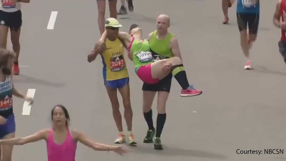 2 men help NJ woman cross Boston Marathon finish line