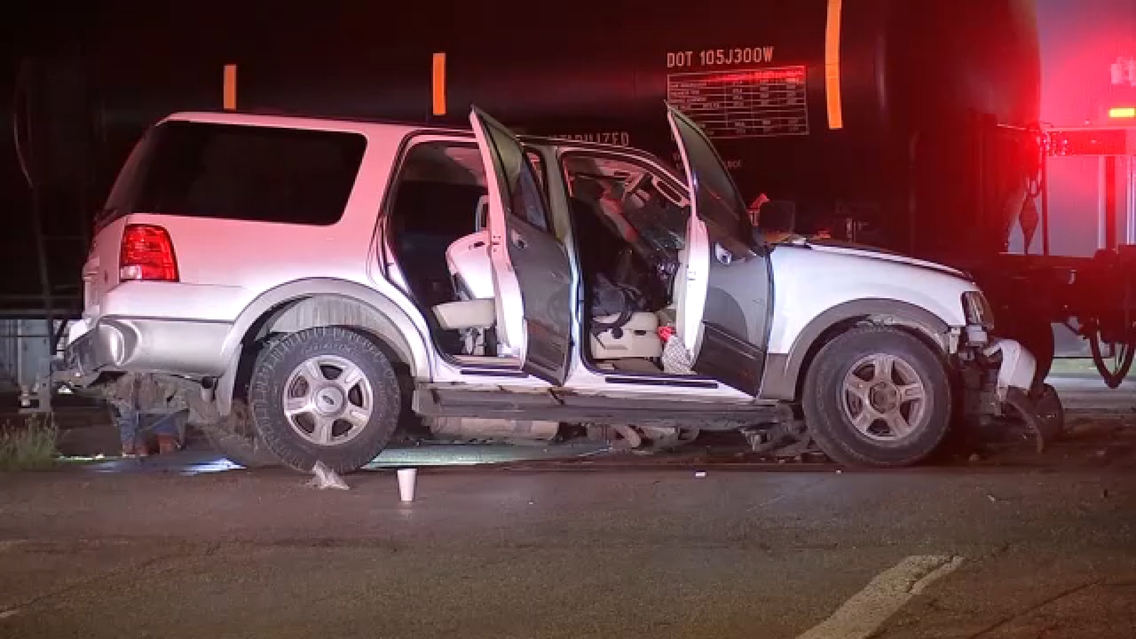 Train collides with car that had woman, 2 dogs inside near downtown Houston, HPD says