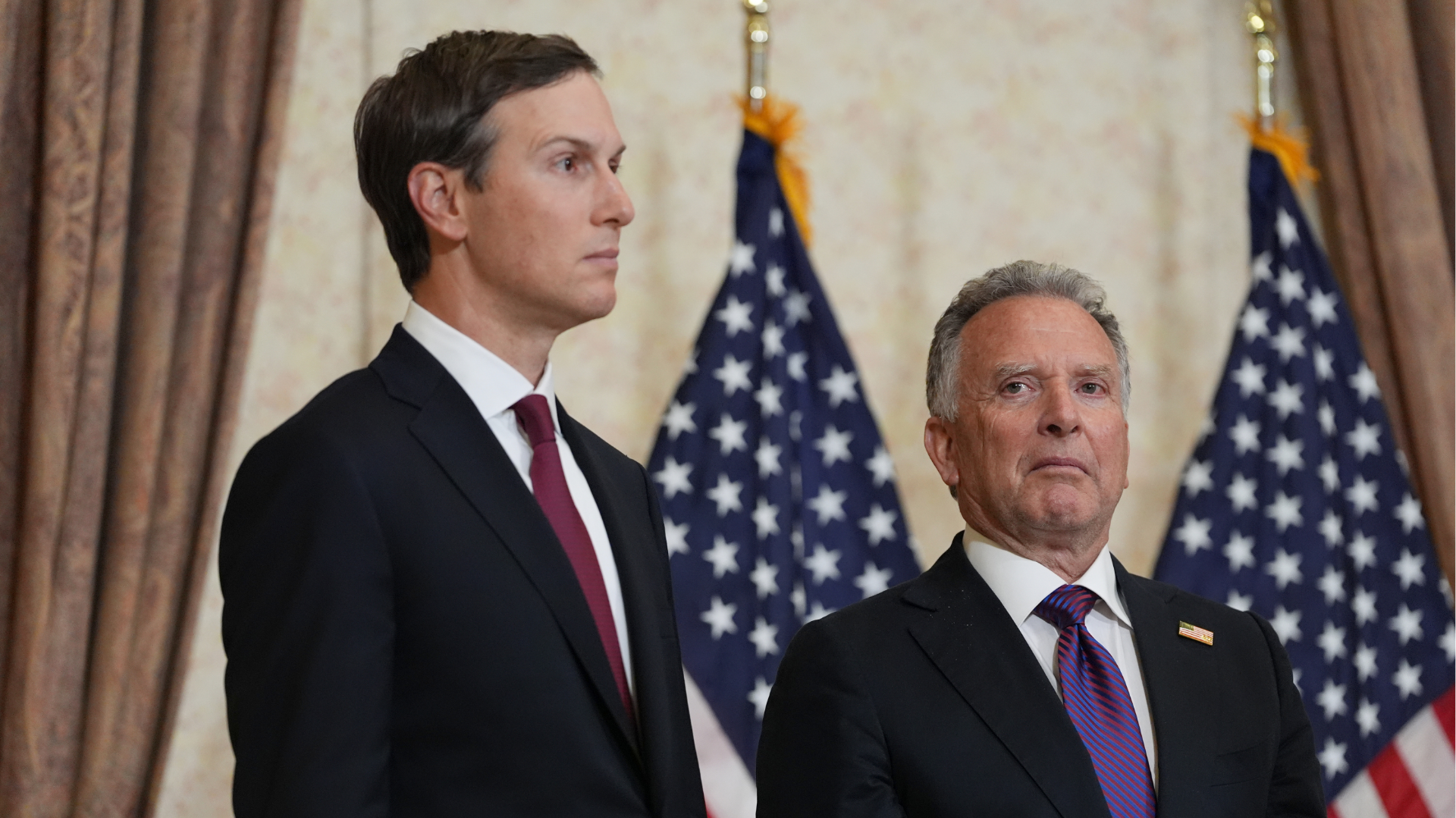 Jared Kushner, left, and Steve Witkoff, listen during a news conference after meeting with representatives from Pakistan and Iran, Sunday, April 12, 2026, in Islamabad, Pakistan.