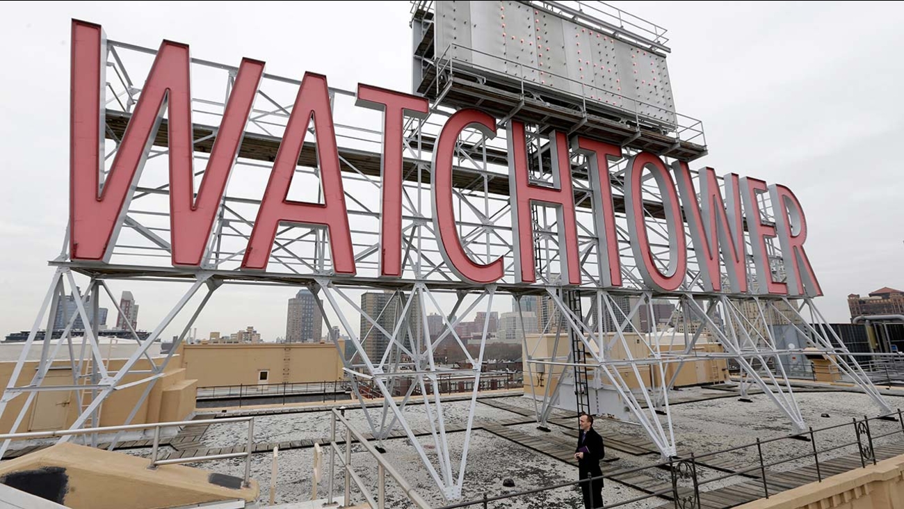 Watchtower sign is seen on the roof of 25-30 Columbia Heights, the current world headquarters of the Jehovah's Witnesses, in the Brooklyn borough of New York.