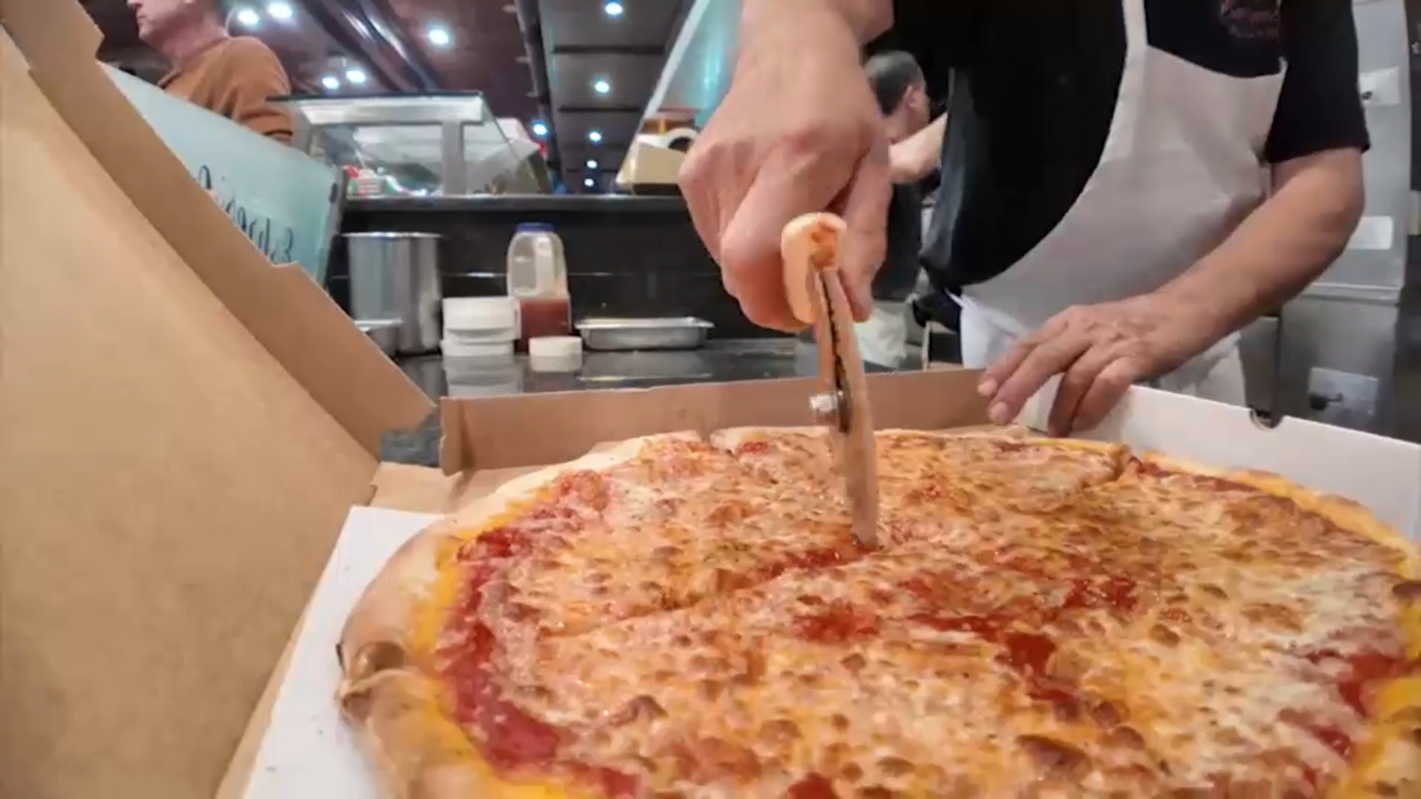 Long Island pizzeria reopens, keeps business in the family