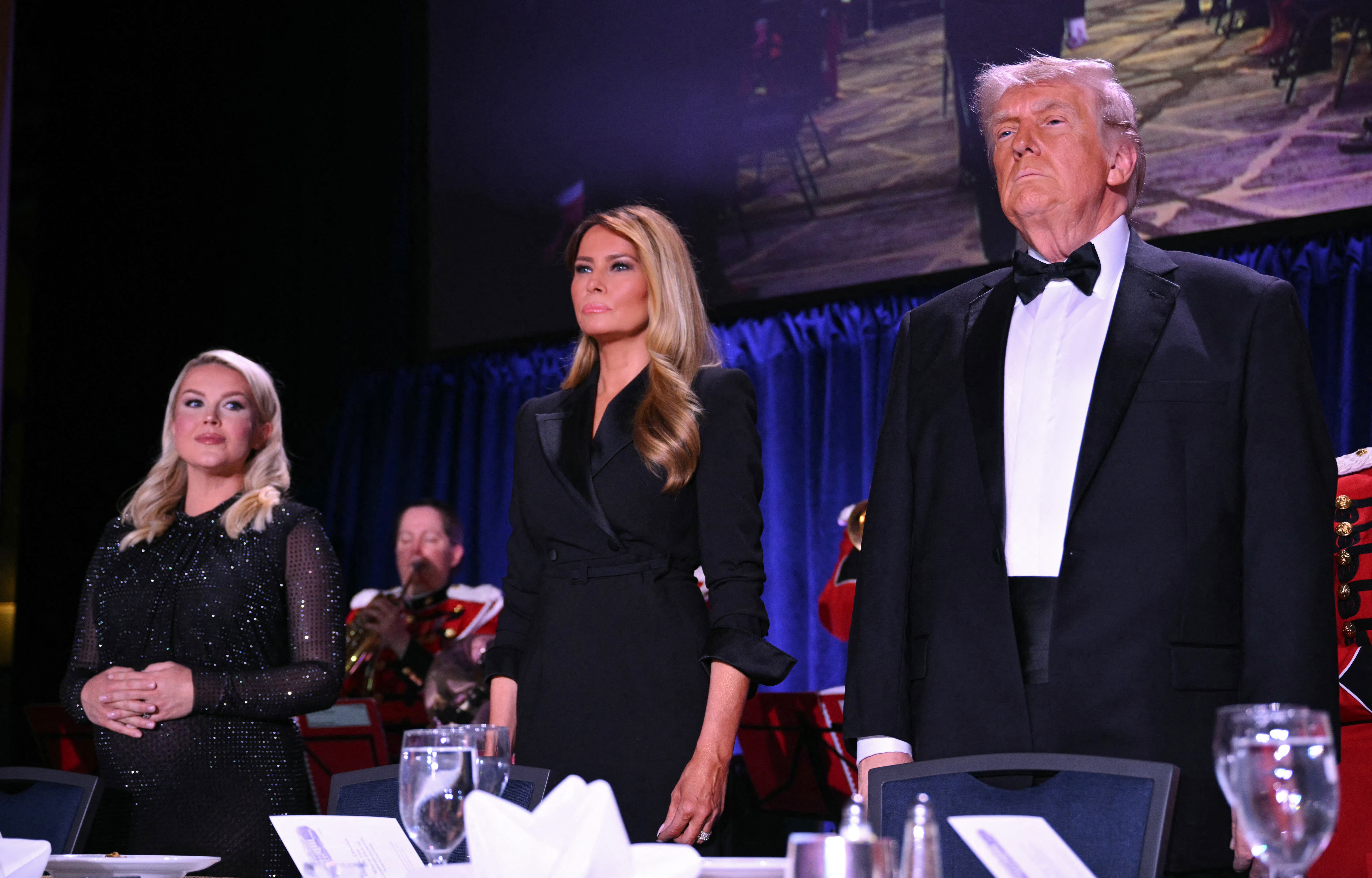 White House Press Secretary Karoline Leavitt, US First Lady Melania Trump and US President Donald Trump attend the White House Correspondents' dinner at the Washington Hilton.