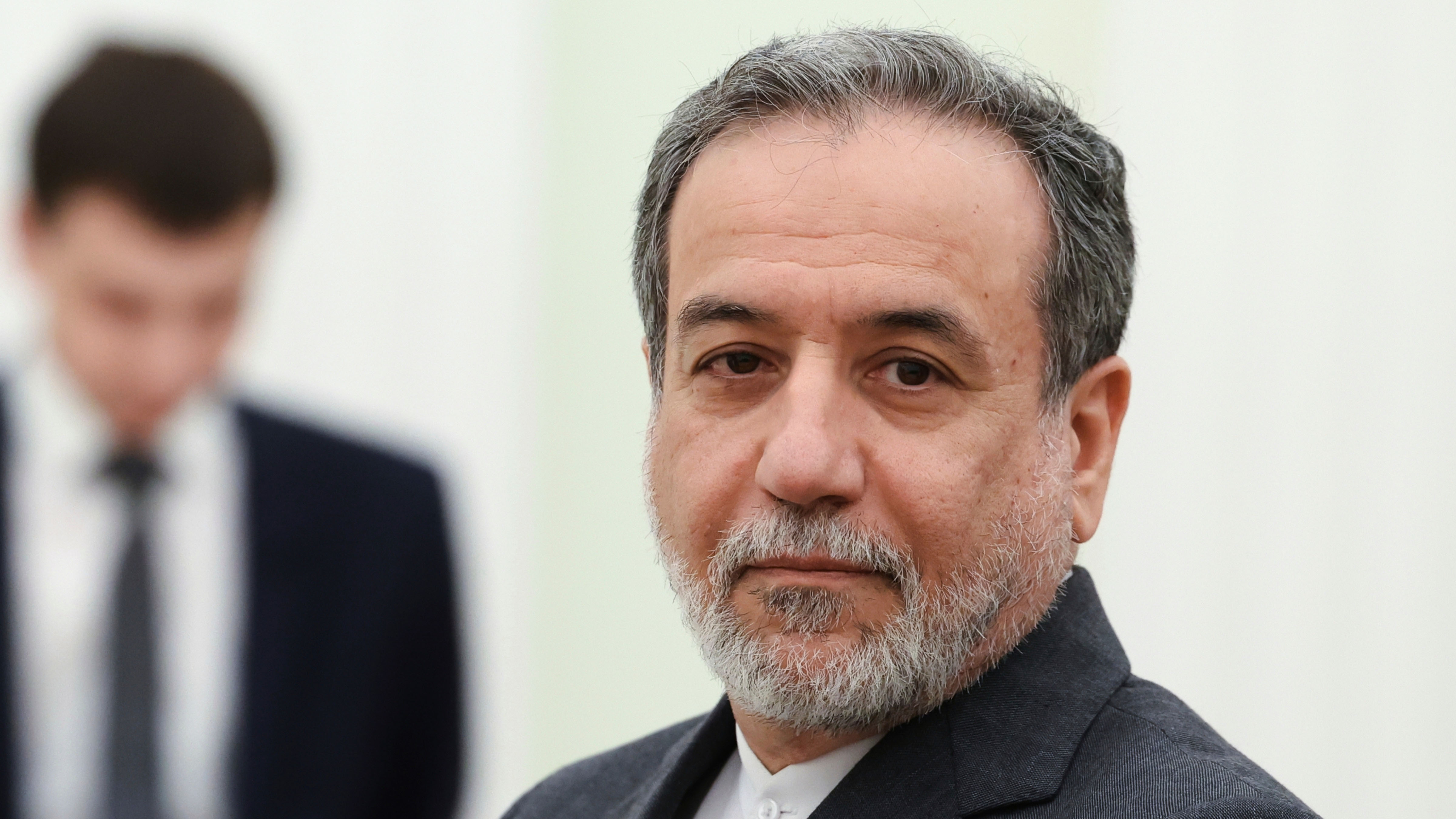 Iranian Foreign Minister Abbas Araghchi stands waiting to meet Russian President Vladimir Putin for the talks at the Kremlin in Moscow, Russia, June 23, 2025.