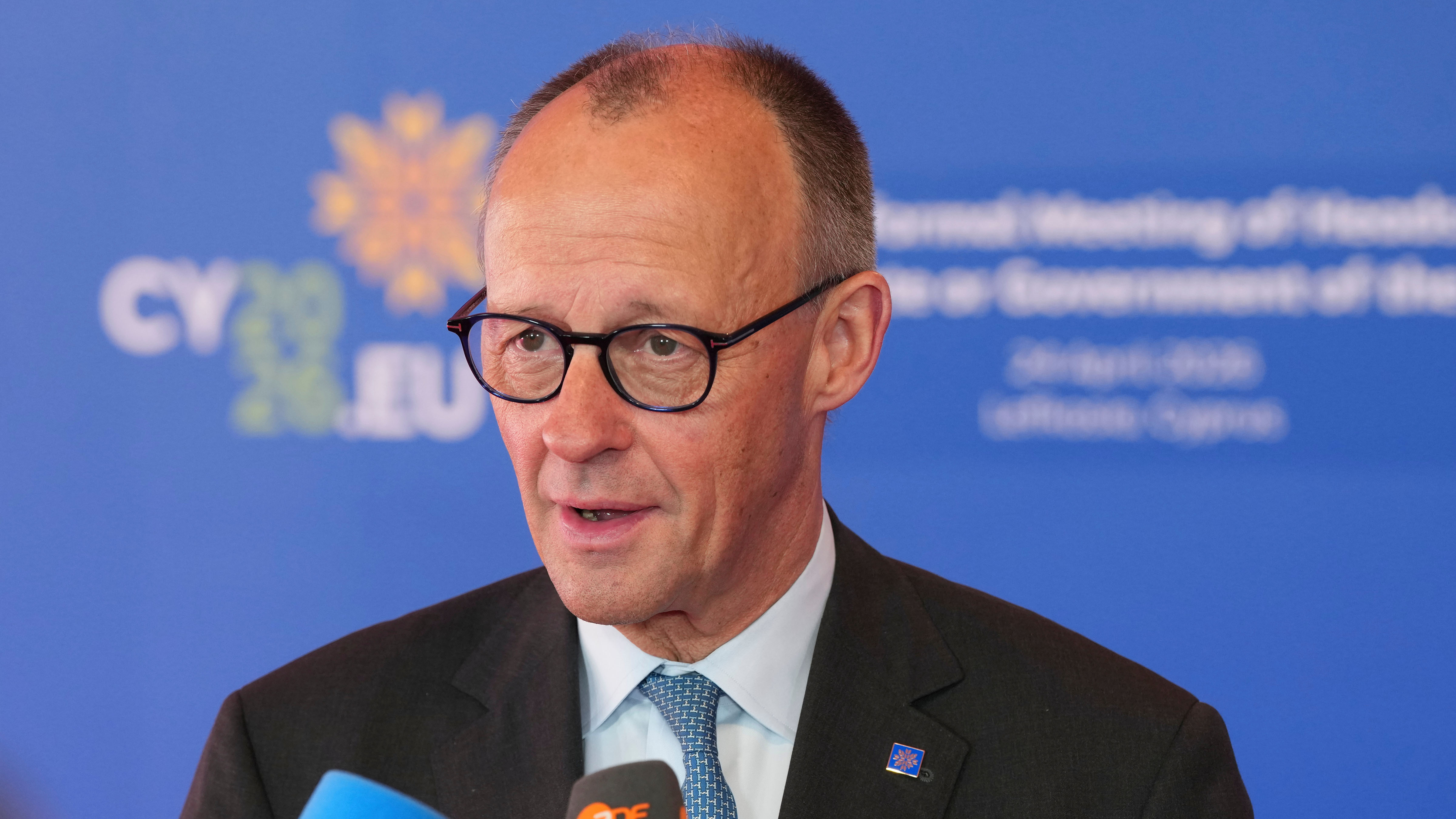 German Chancellor Friedrich Merz speaks with the media as he arrives for the EU Summit in Nicosia, Cyprus, Friday, April 24, 2026.