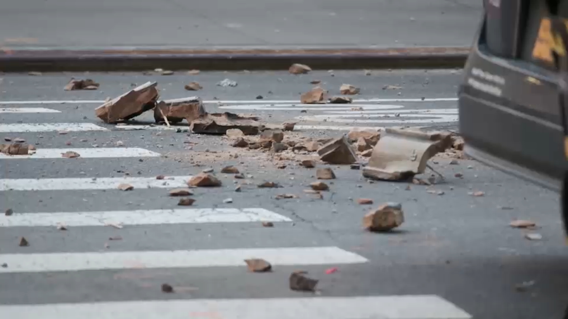 Debris crashes down to street below from 16th floor of NYC building