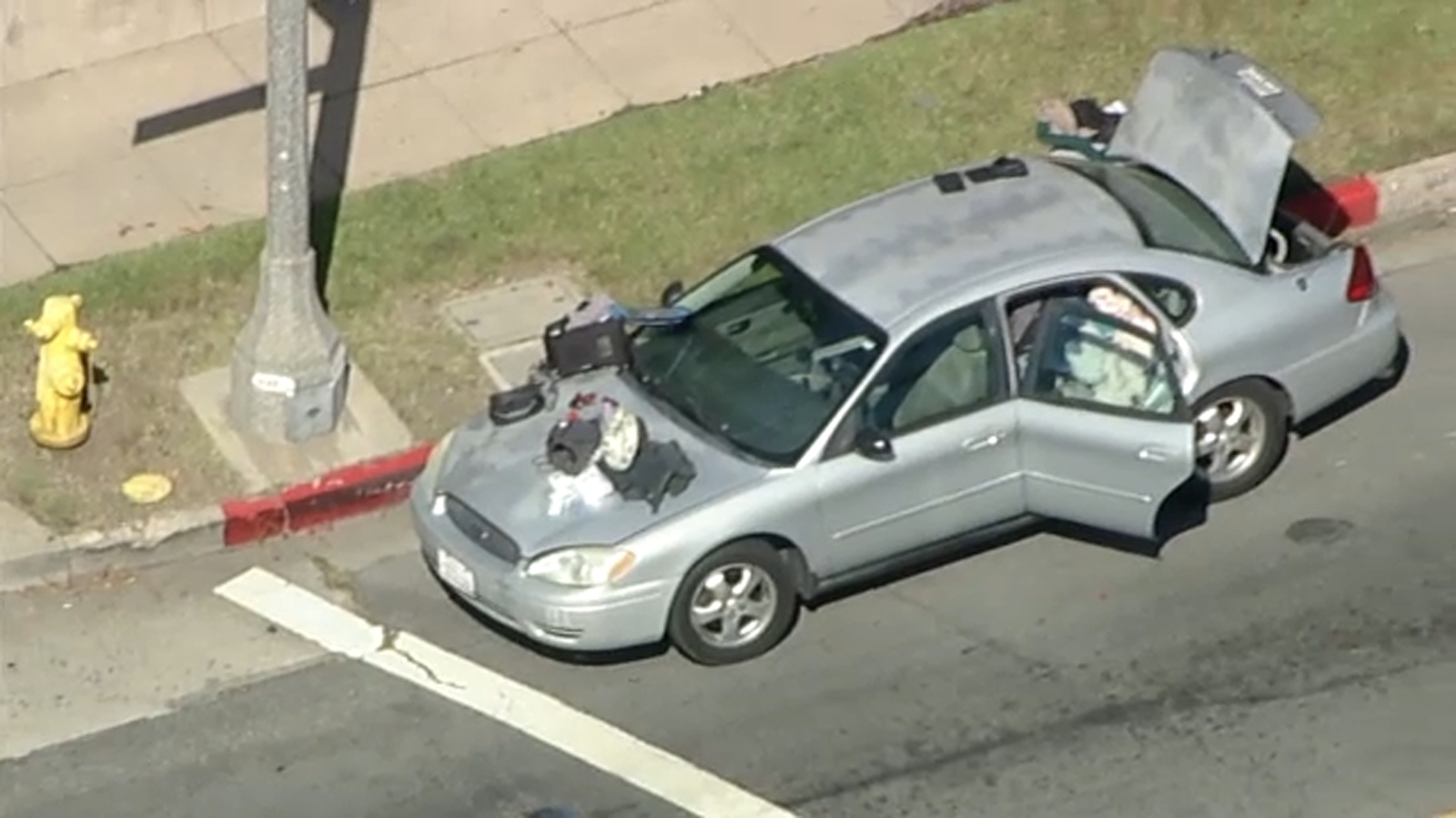 Driver flees traffic stop after man with gunshot wound found in trunk in San Marino, police say