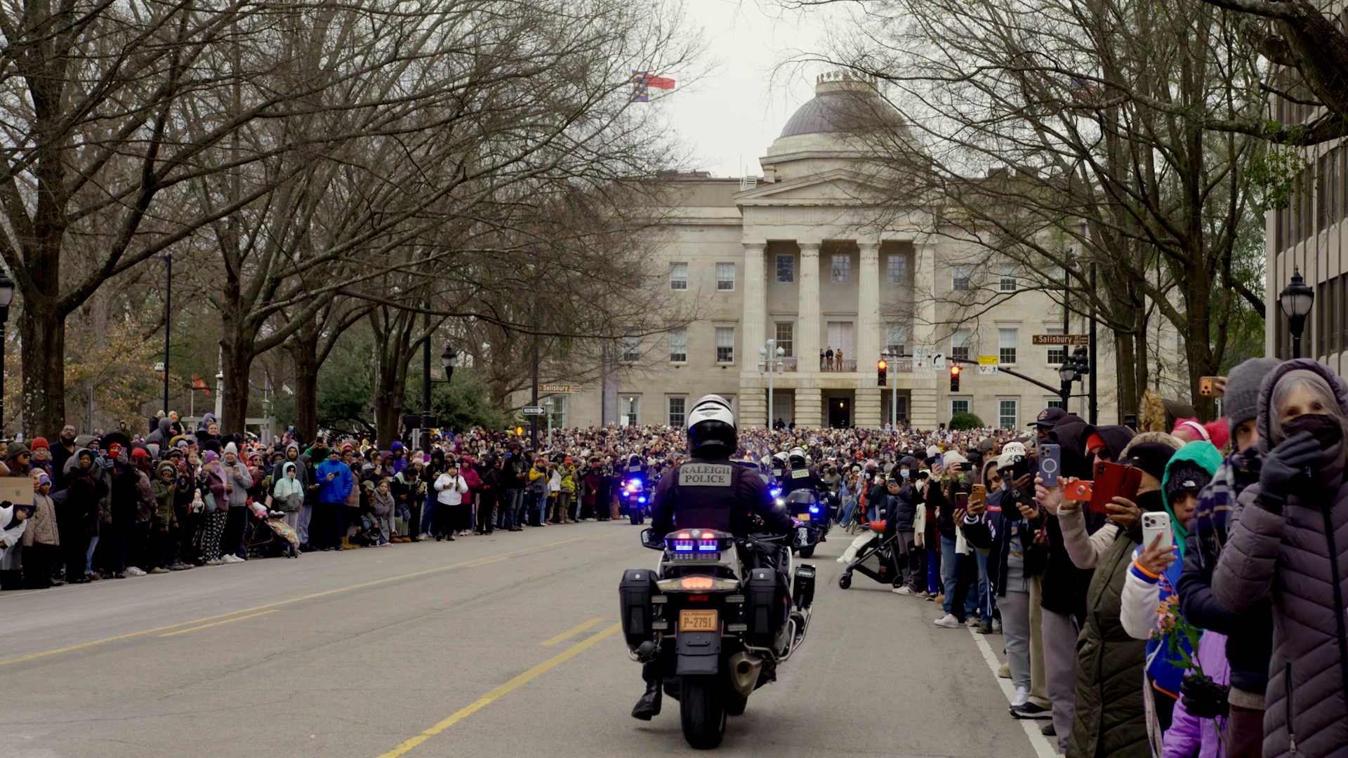 Law enforcement escorts the Walk for Peace into Raleigh. In North Carolina, officers stayed with the monks from the South Carolina border to Virginia.