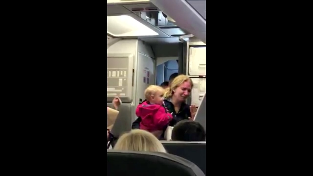 VIDEO: Mother allegedly hit by American Airlines employee on flight at SFO