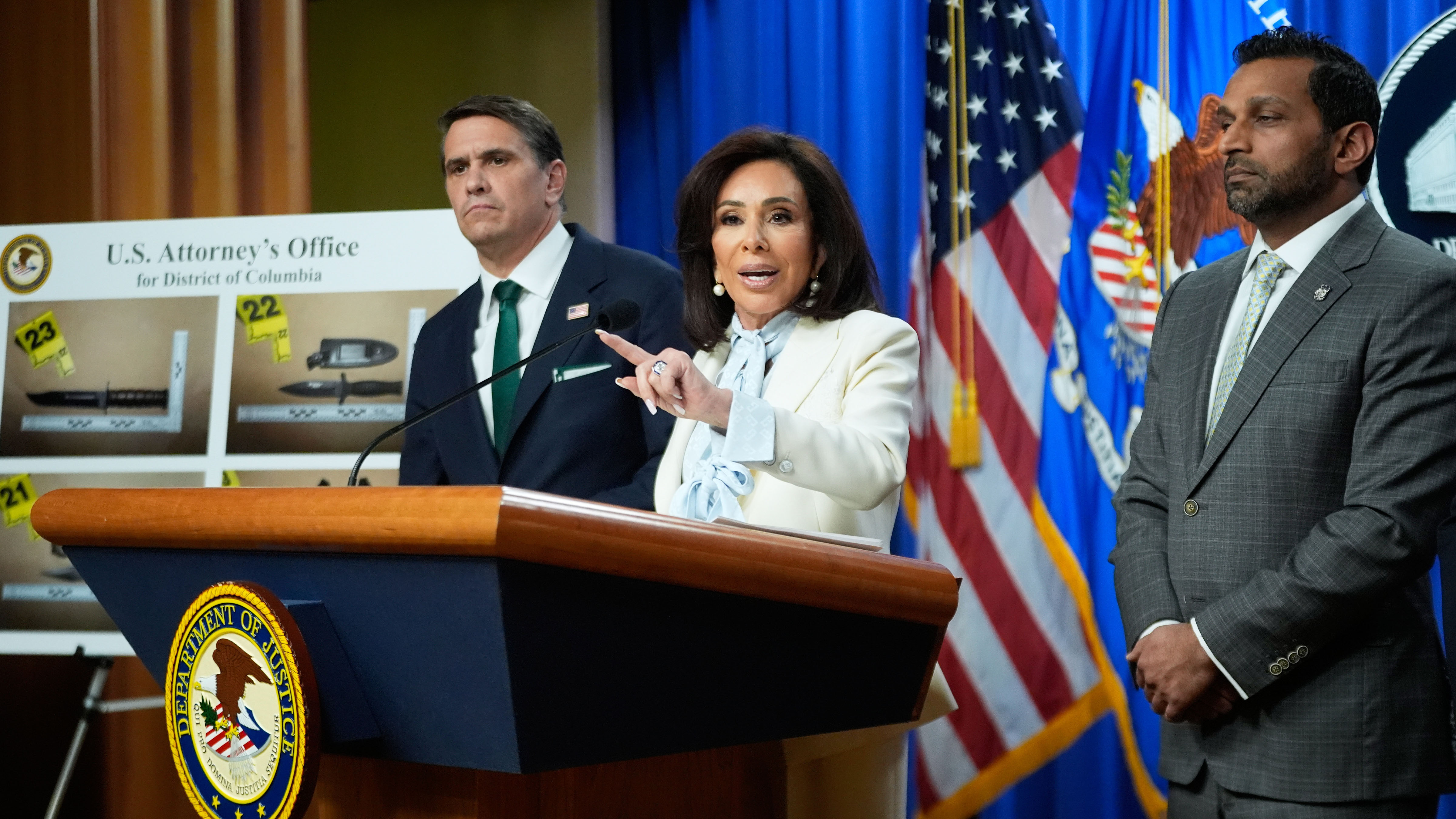 From left, Acting Attorney General Todd Blanche, U.S. Attorney Jeanine Pirro and FBI Director Kash Patel, speak during a news conference at the Department of Justice, on Monday April 27, 2026, in Washington.