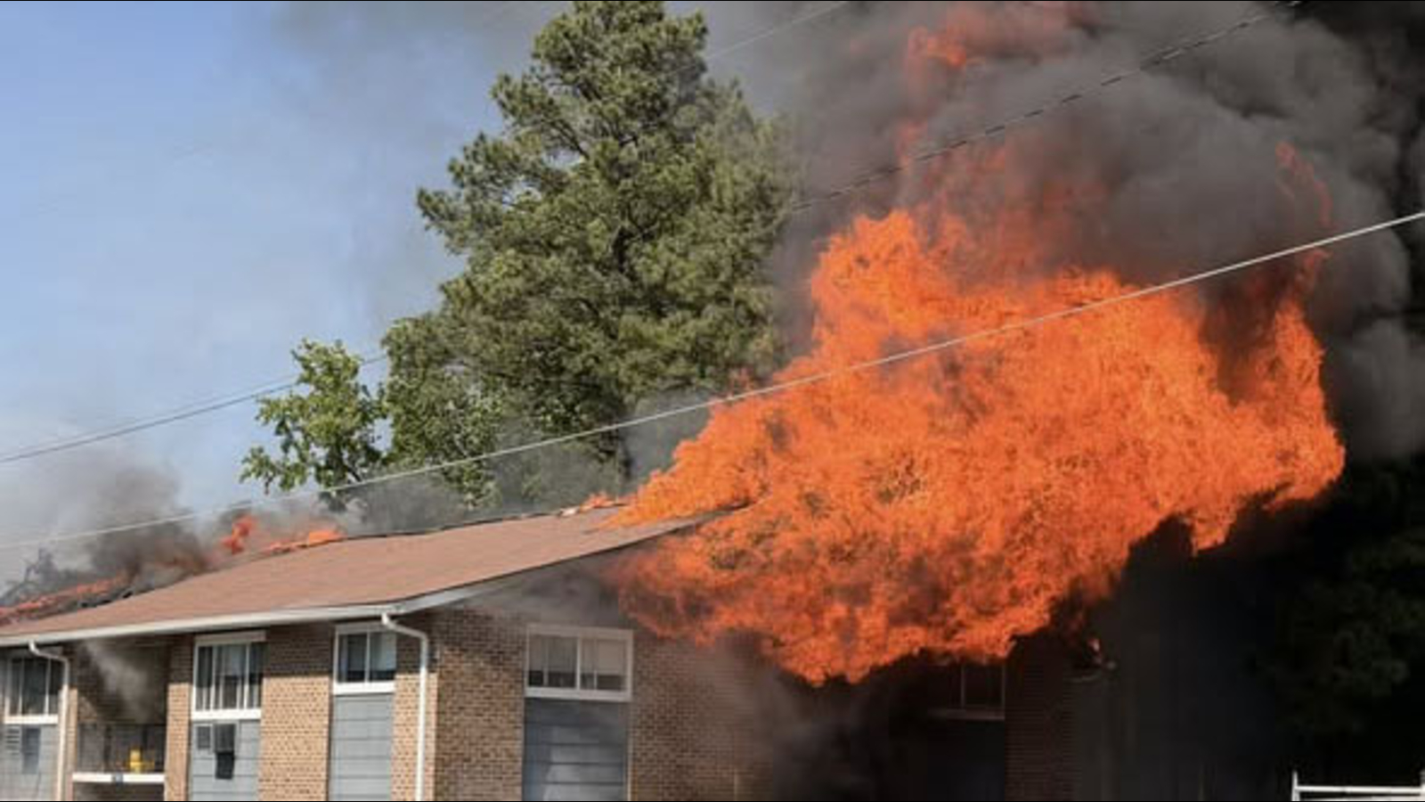 1 dead, 20 displaced in huge Carrboro residential fire