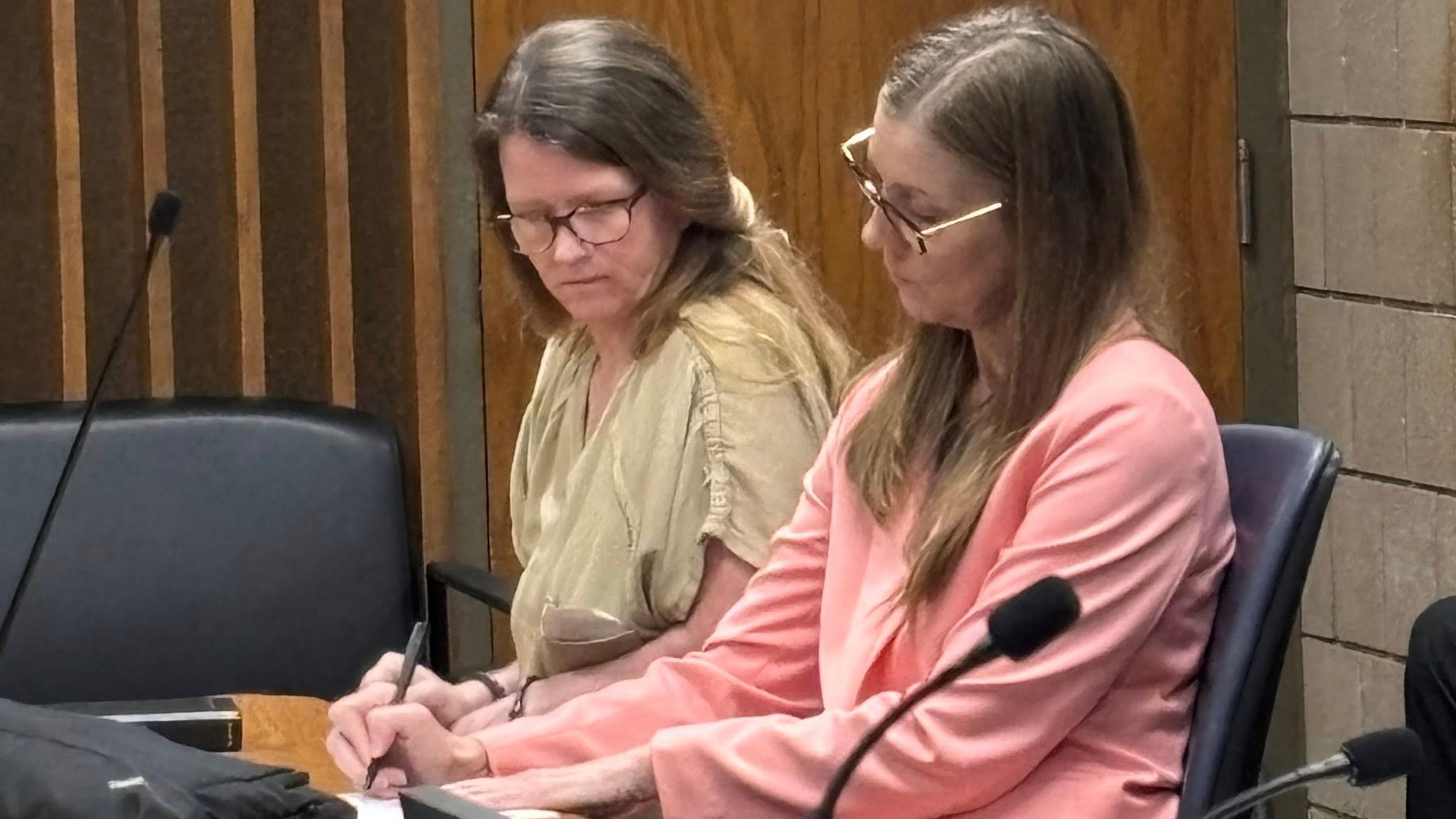 Shana Cloud (wearing tan jail suit) at bond reduction hearing with her attorney Michelle Moore (Tuesday, May 5, 2026)