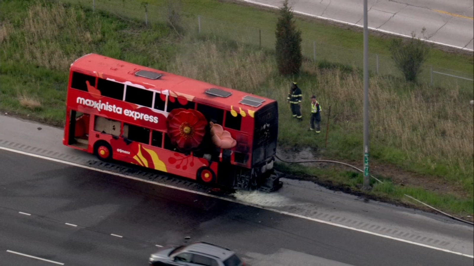 TJ Maxx double-decker bus catches fire in south suburbs, video shows