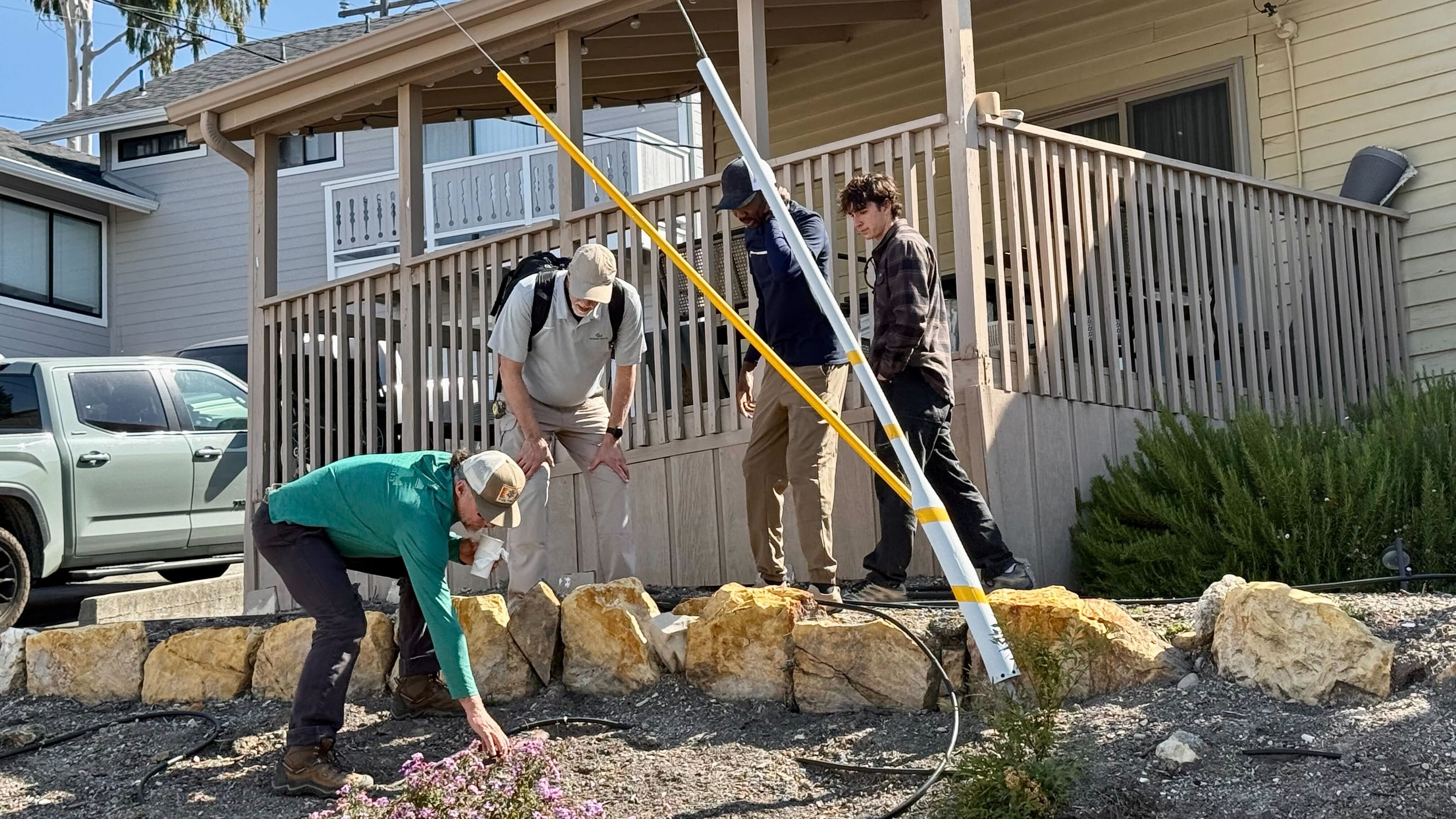 Scientists take samples from the soil Thursday, May 7, 2026, from the neighboring yard of a home in Arroyo Grande, Calif., connected to the man convicted of killing Kristin Smart as part of a sheriff's investigation.
