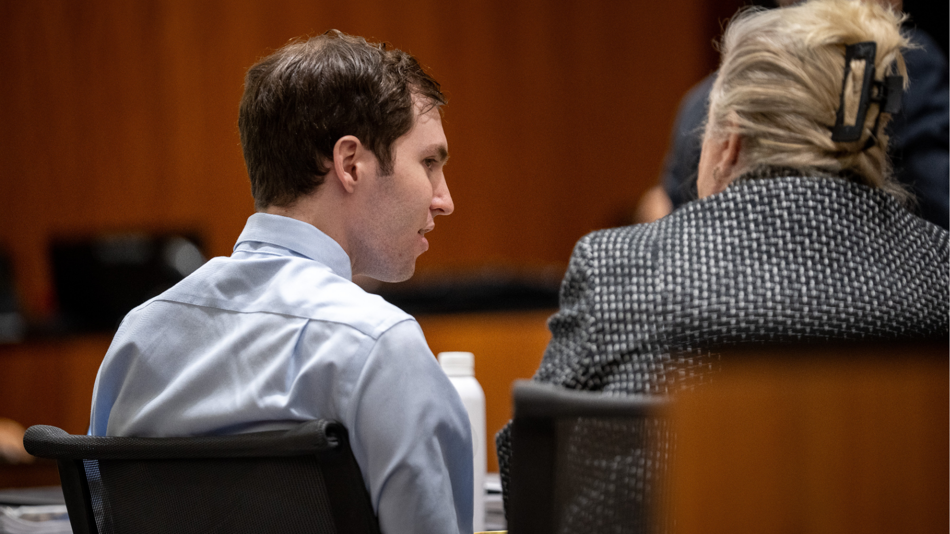 Tyler Robinson, left, speaks with his attorney Kathryn Nester in 4th District Court in Provo, Utah, on Friday, April 17, 2026. 