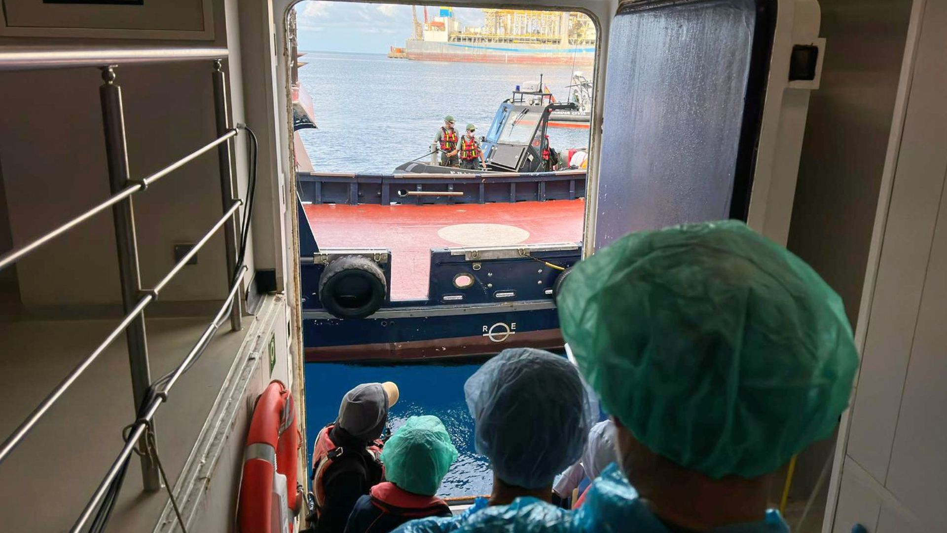 Passengers are being disembarked from the hantavirus-stricken cruise ship MV Hondius at the port of Granadilla in Tenerife, Canary Islands, Spain, Sunday, May 10, 2026.