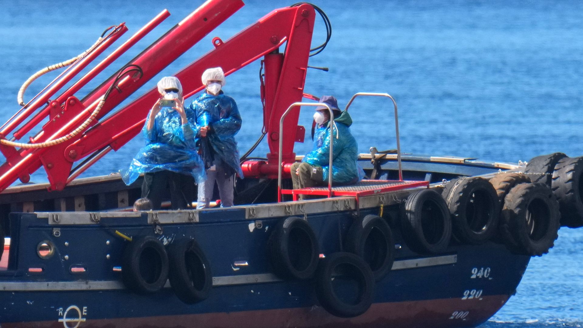 Passengers are disembarked from the hantavirus-stricken cruise ship MV Hondius at the port of Granadilla in Tenerife, Canary Islands, Spain, Sunday, May 10, 2026.