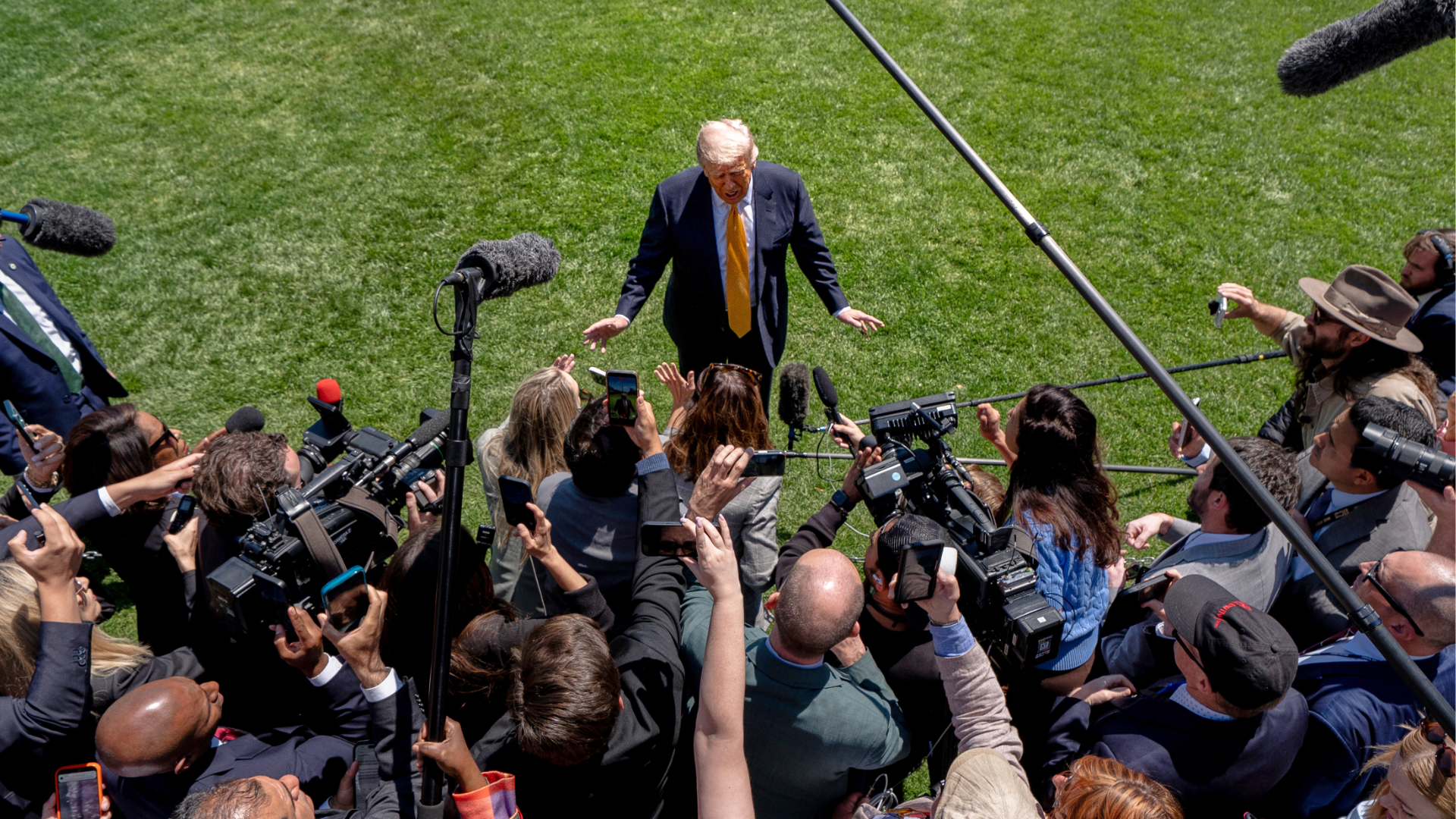 President Donald Trump speaks with reporters before departing the White House for a trip to Beijing, to meet with China's President Xi Jinping, Tuesday, May 12, 2026, in Washington. 