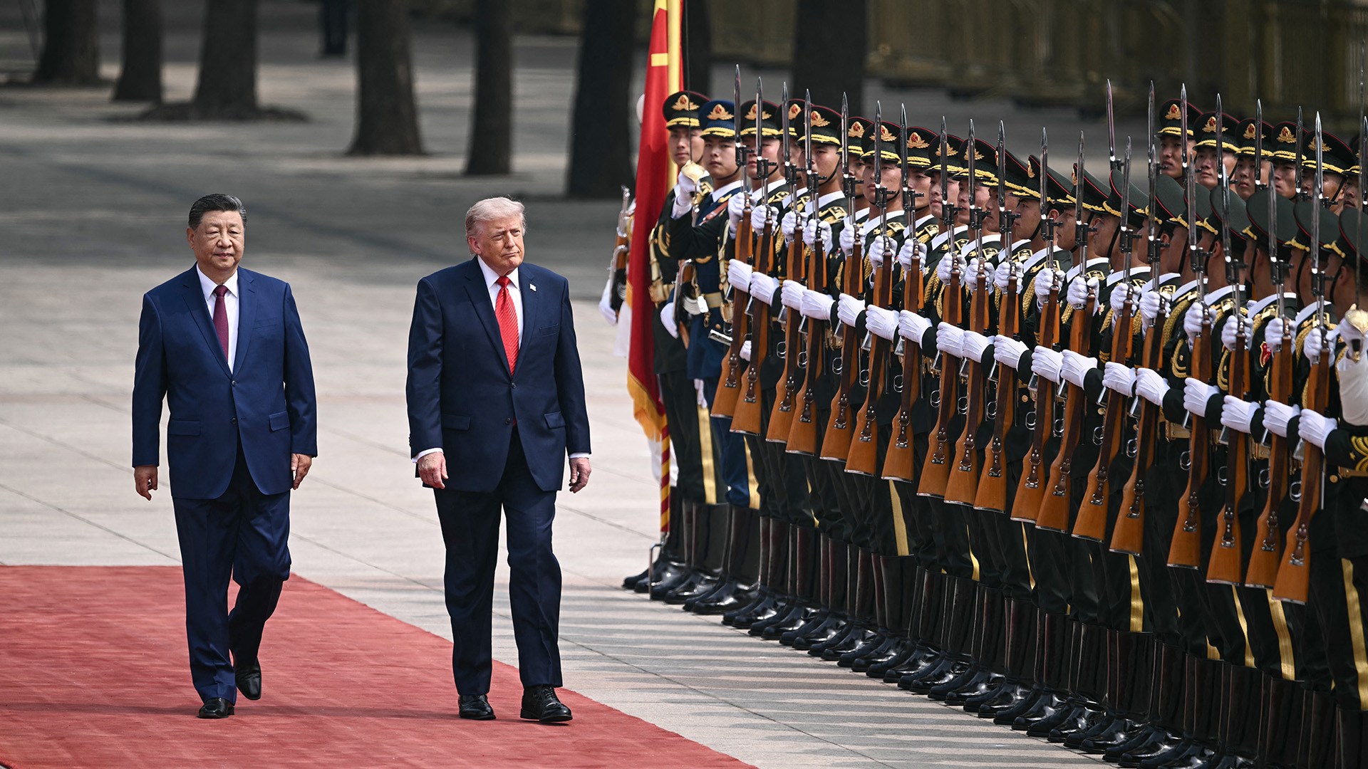 President Donald Trump and China's President Xi Jinping inspect a guard of honor during a welcome ceremony at the Great Hall of the People in Beijing on May 14, 2026.