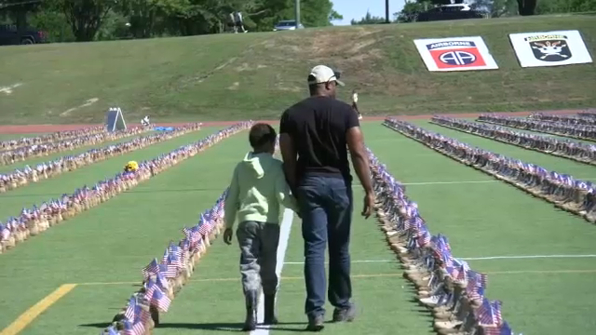 Veteran Jean Dorleus, came with his son to pay their respects.