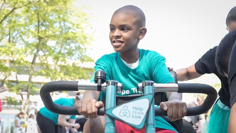 8-year-old boy with autism gets surprised with adaptive bicycle