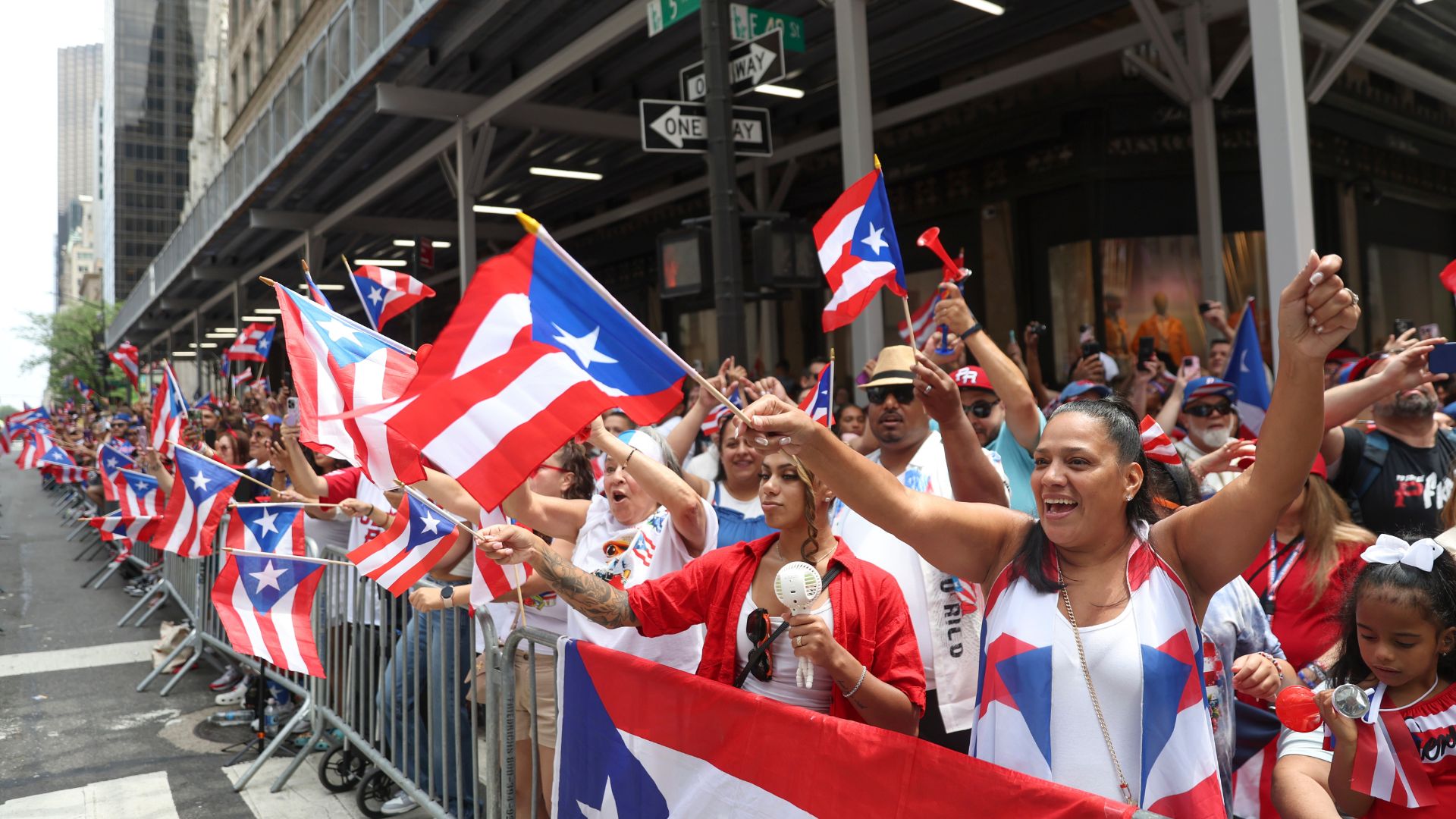 The crowd cheers as the Puerto Rican Day Parade makes its way down Fifth Avenue, Sunday, June 8, 2025, in New York.