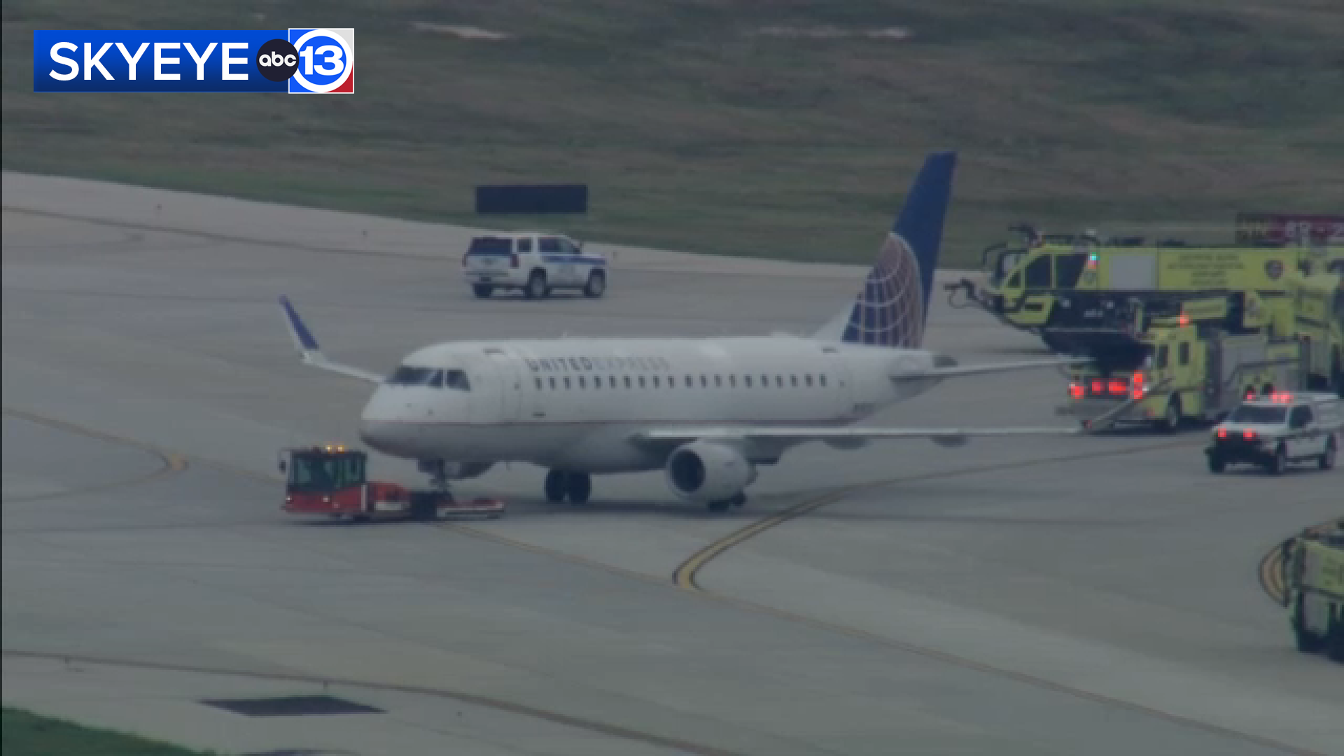 SkyEye13 images showed the United Express plane being towed from the tarmac after the FAA issued a departure ground stop at IAH due to a disabled aircraft.