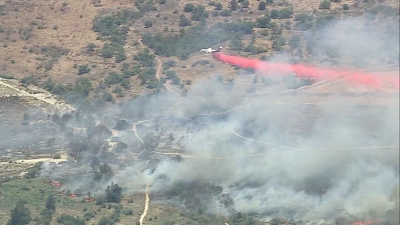 Jurupa Valley brush fire prompts evacuation orders in nearby Riverside, burns at least 100 acres