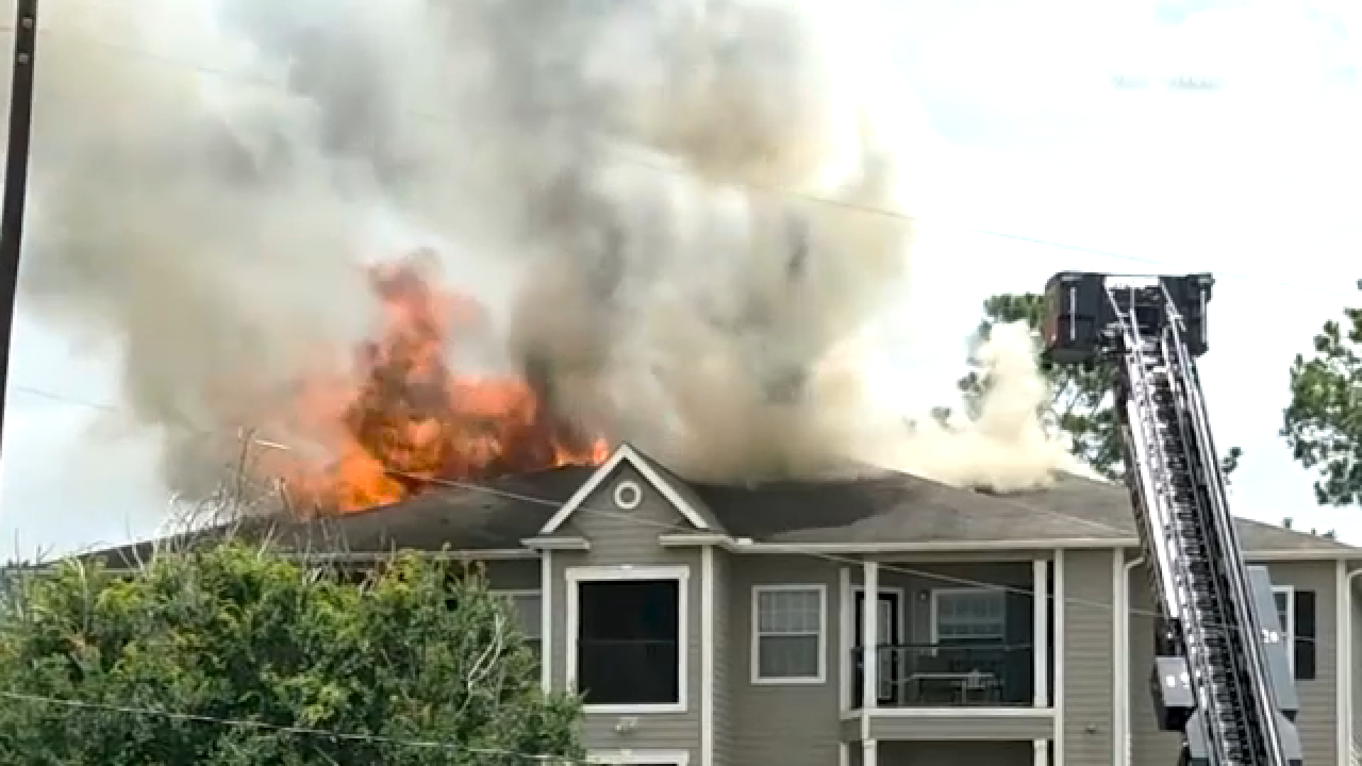 Eyewitness Dan O'Neil captured the flames rising from the apartment complex from the ground.