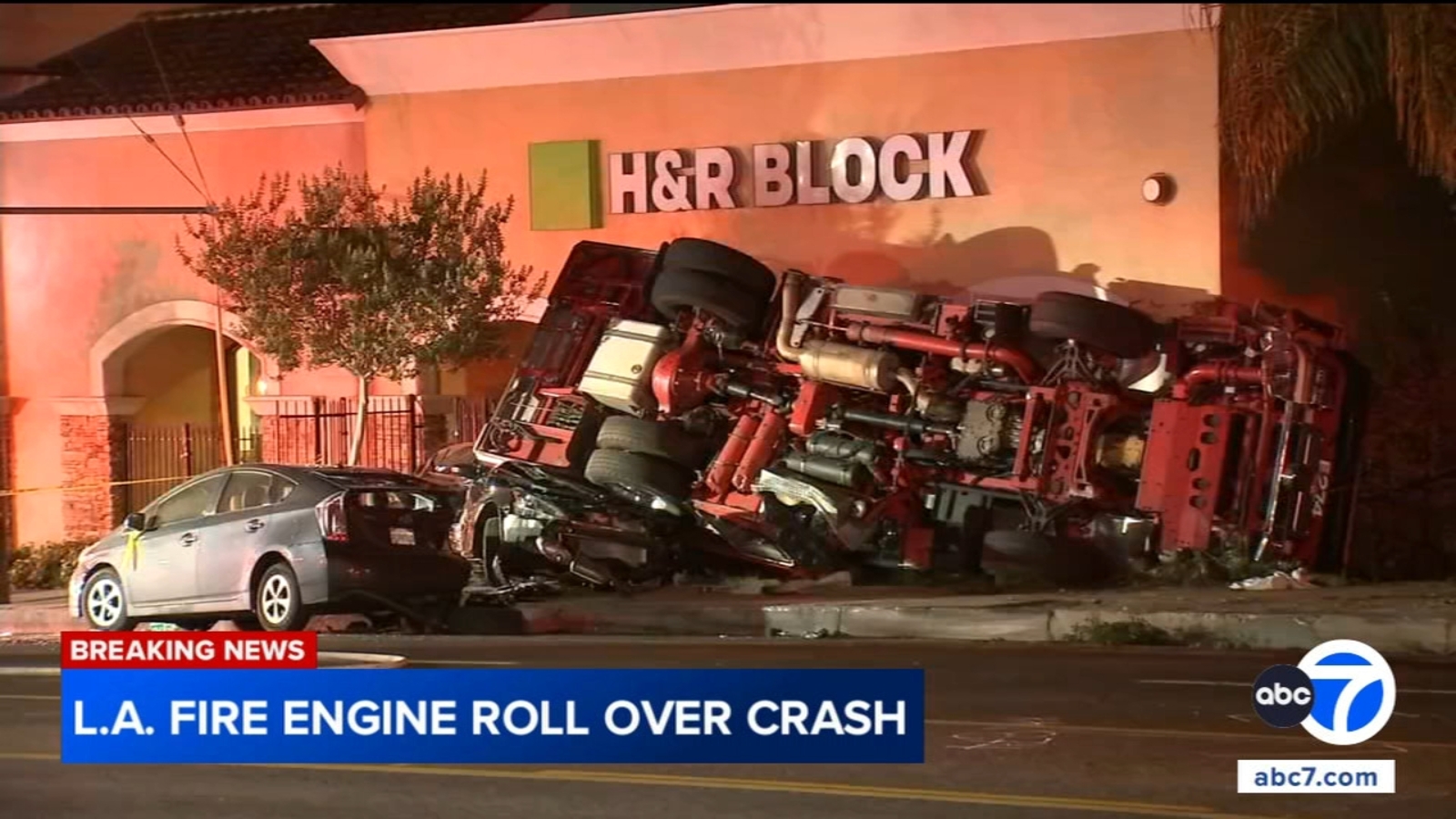 2 LAFD firefighters injured after fire truck overturns in crash caught ...