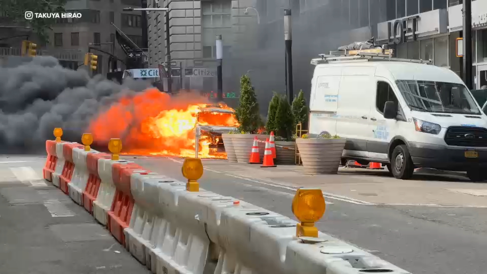 Car catches fire and explodes near Charging Bull statue