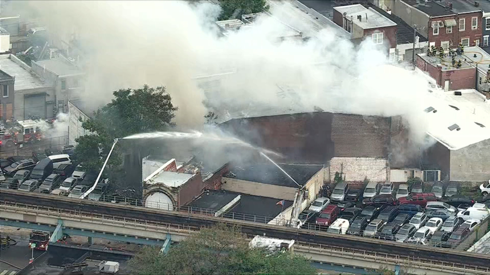 Massive fire erupts at warehouse in Kensington