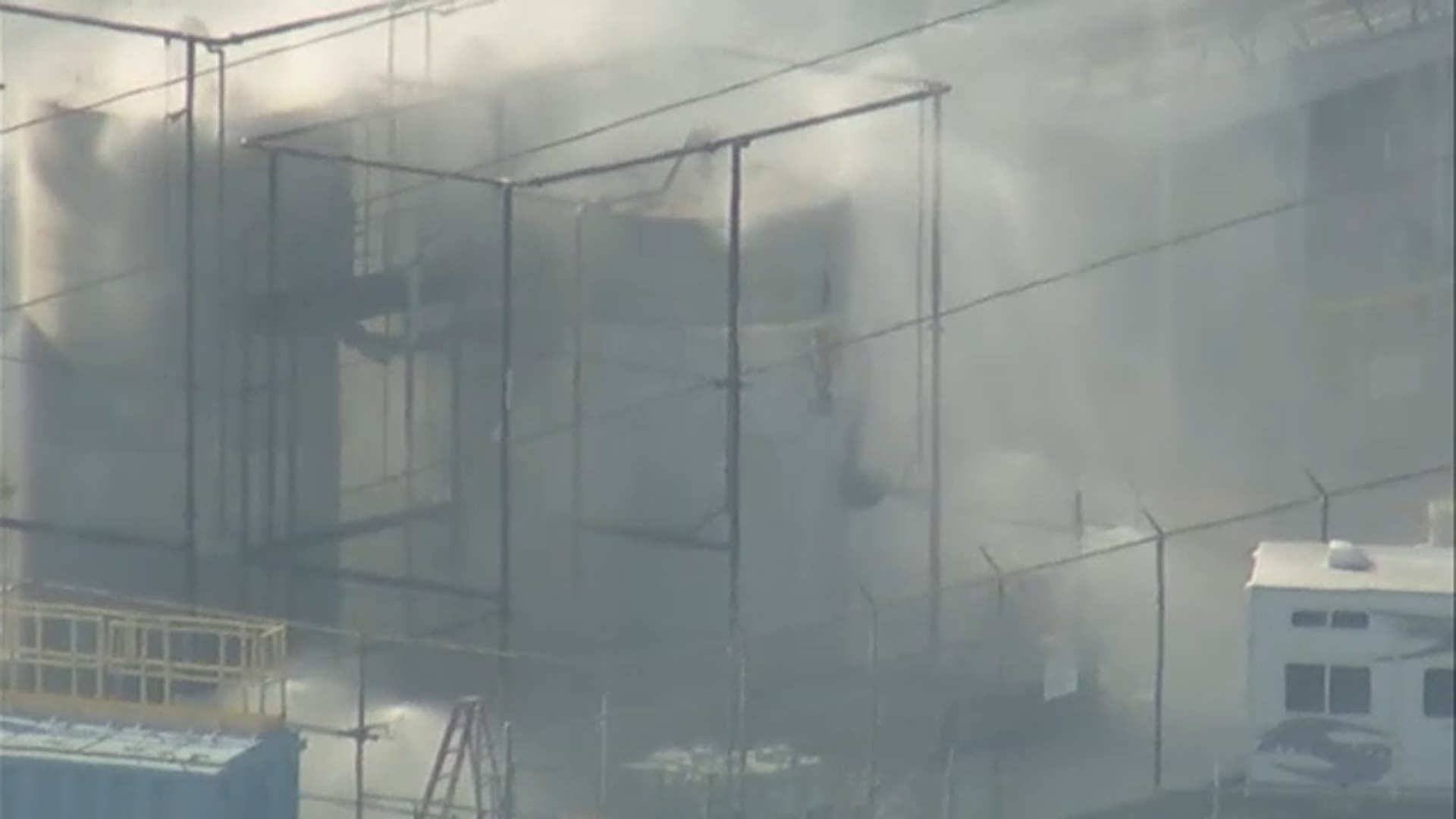 Multiple cracks discovered; crews spotted climbing unstable tank