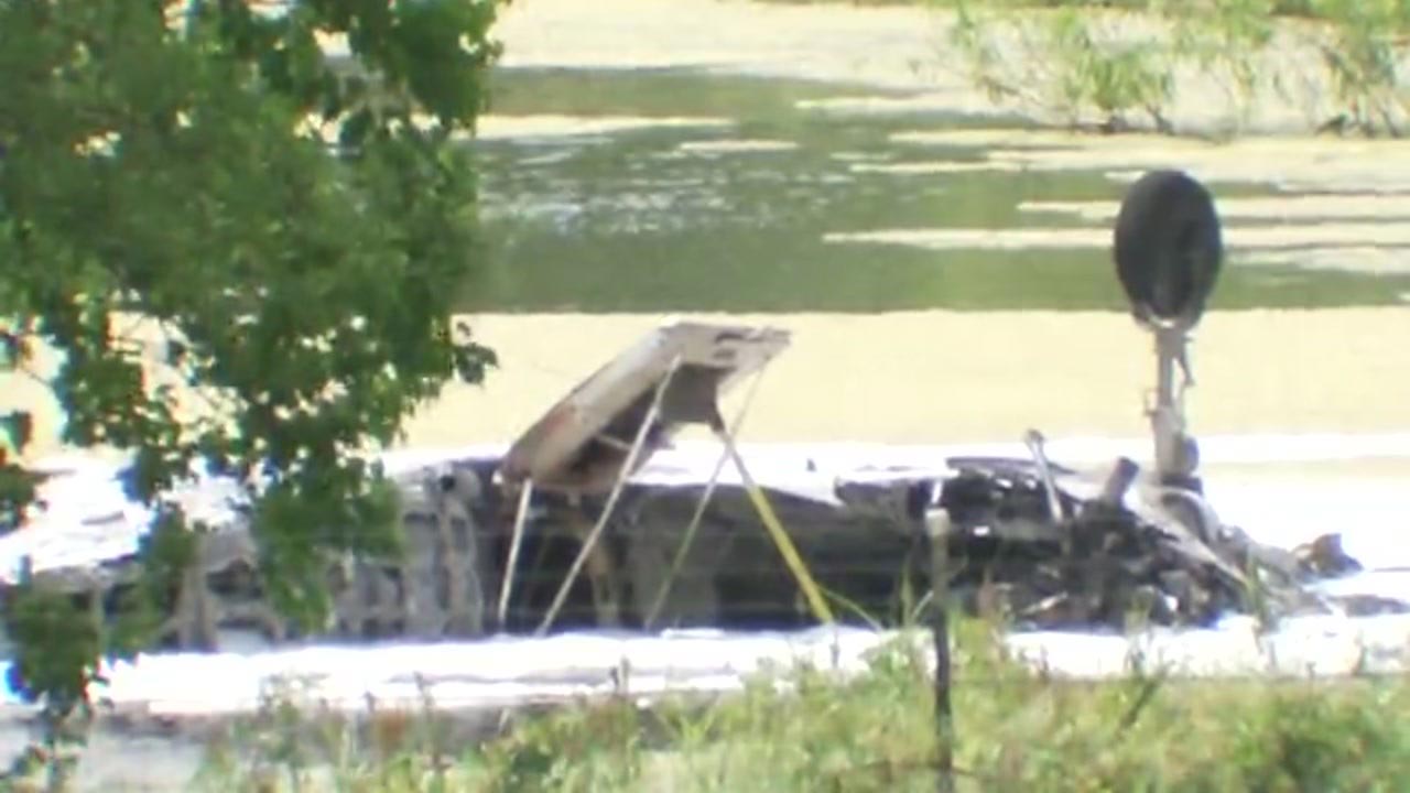 Body pulled from pond where small plane crashed
