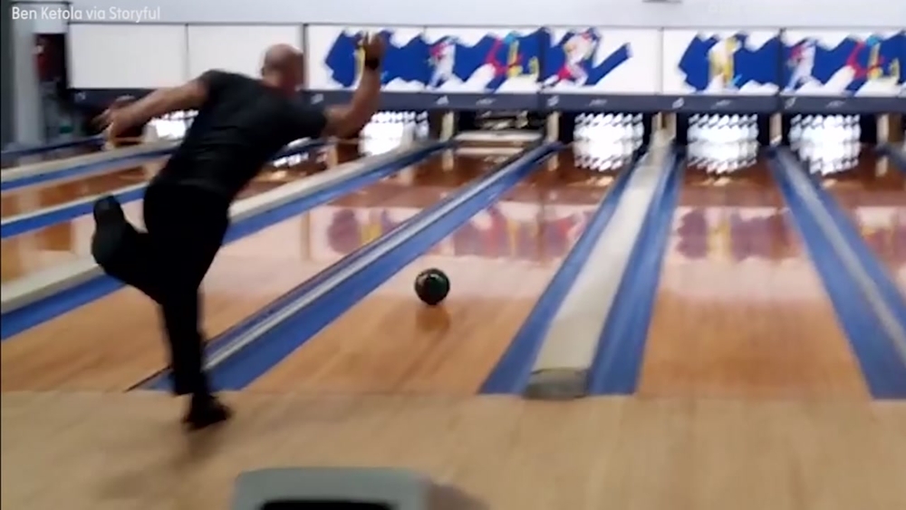 Watch a bowler roll the 'world's fastest' perfect game