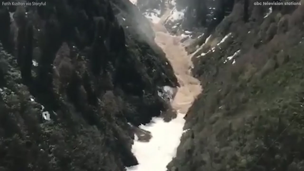 Watch this spectacular avalanche of thawed ice
