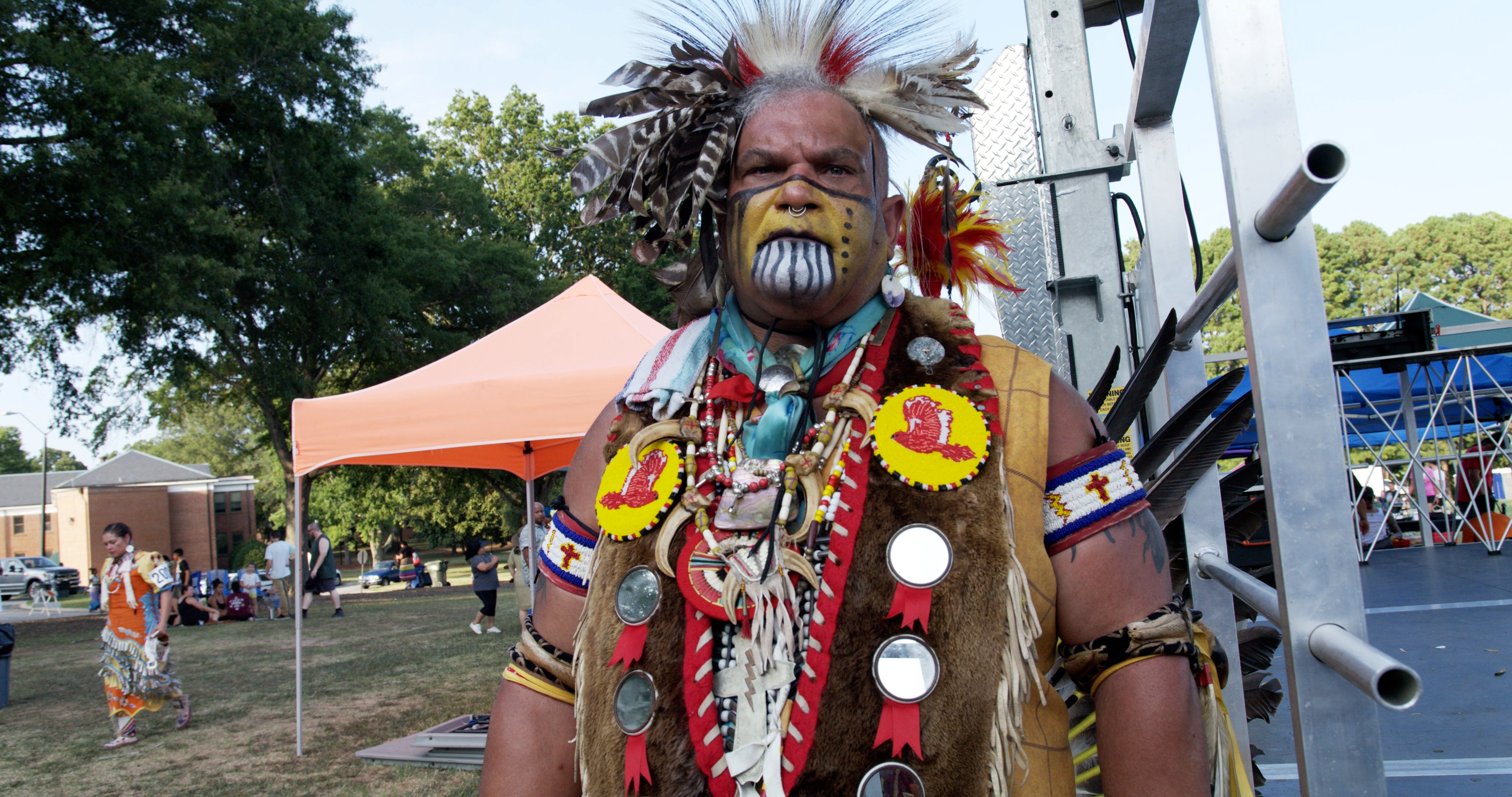 A visiting member of the Powhatan Tribe from Virginia wears traditional regalia at the Dix Park Inter-Tribal Pow Wow in Raleigh.