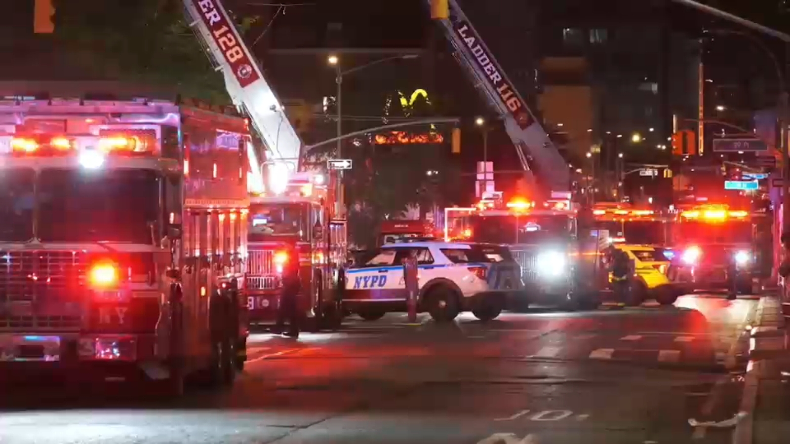 One dead, another person critically injured in Sunnyside apartment fire; firefighter injured