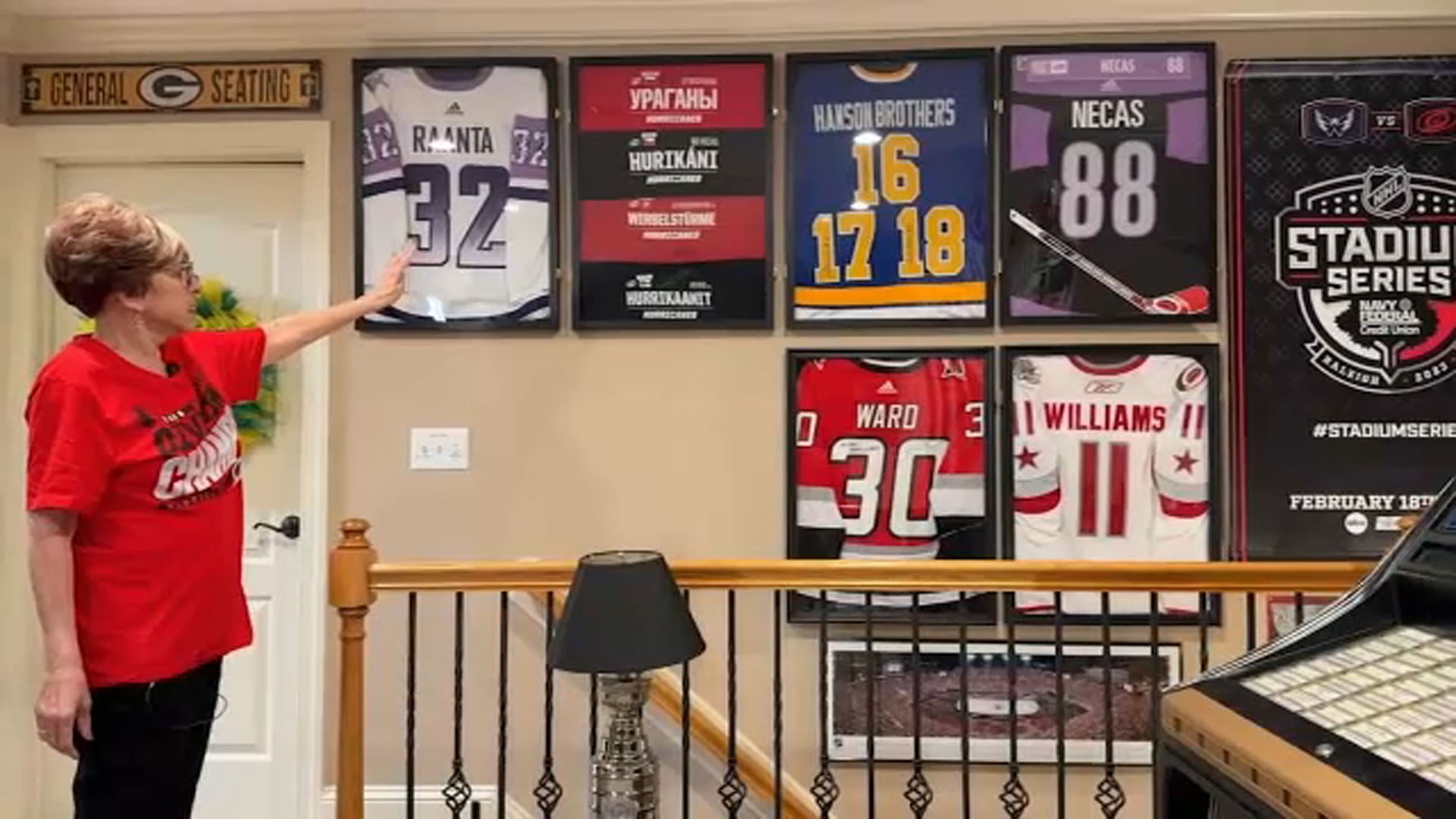 Sue Bohnsack shows off some of her Hurricanes memorabilia.