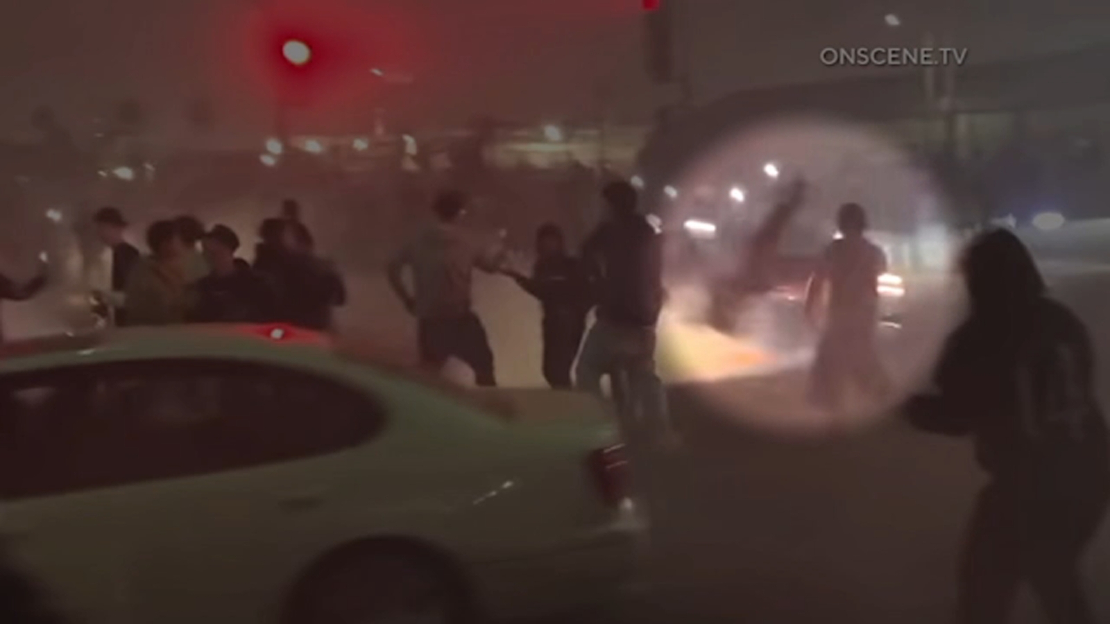 Onlooker struck by car doing donuts at illegal street takeover in Compton, video shows Onlooker struck by car doing donuts at illegal street takeover in Compton, video shows