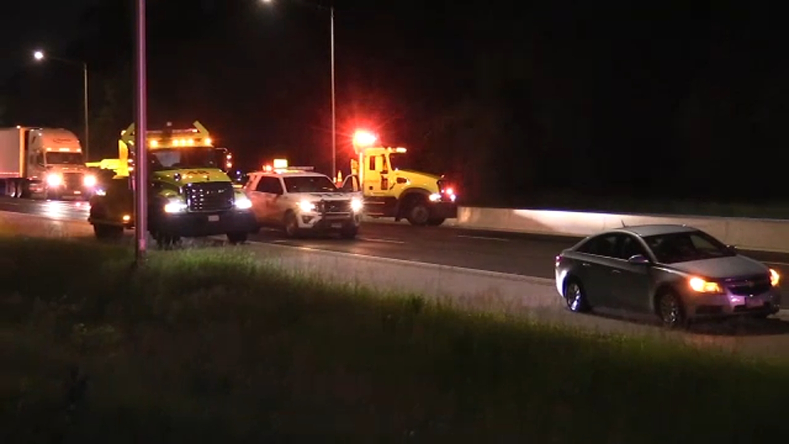 Several cars damaged after debris falls from truck on Edens