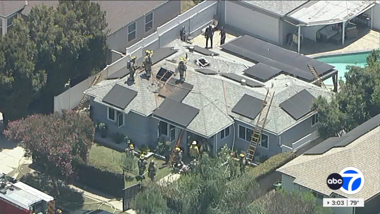 House fire near Reseda becomes crime scene after man found with a gun