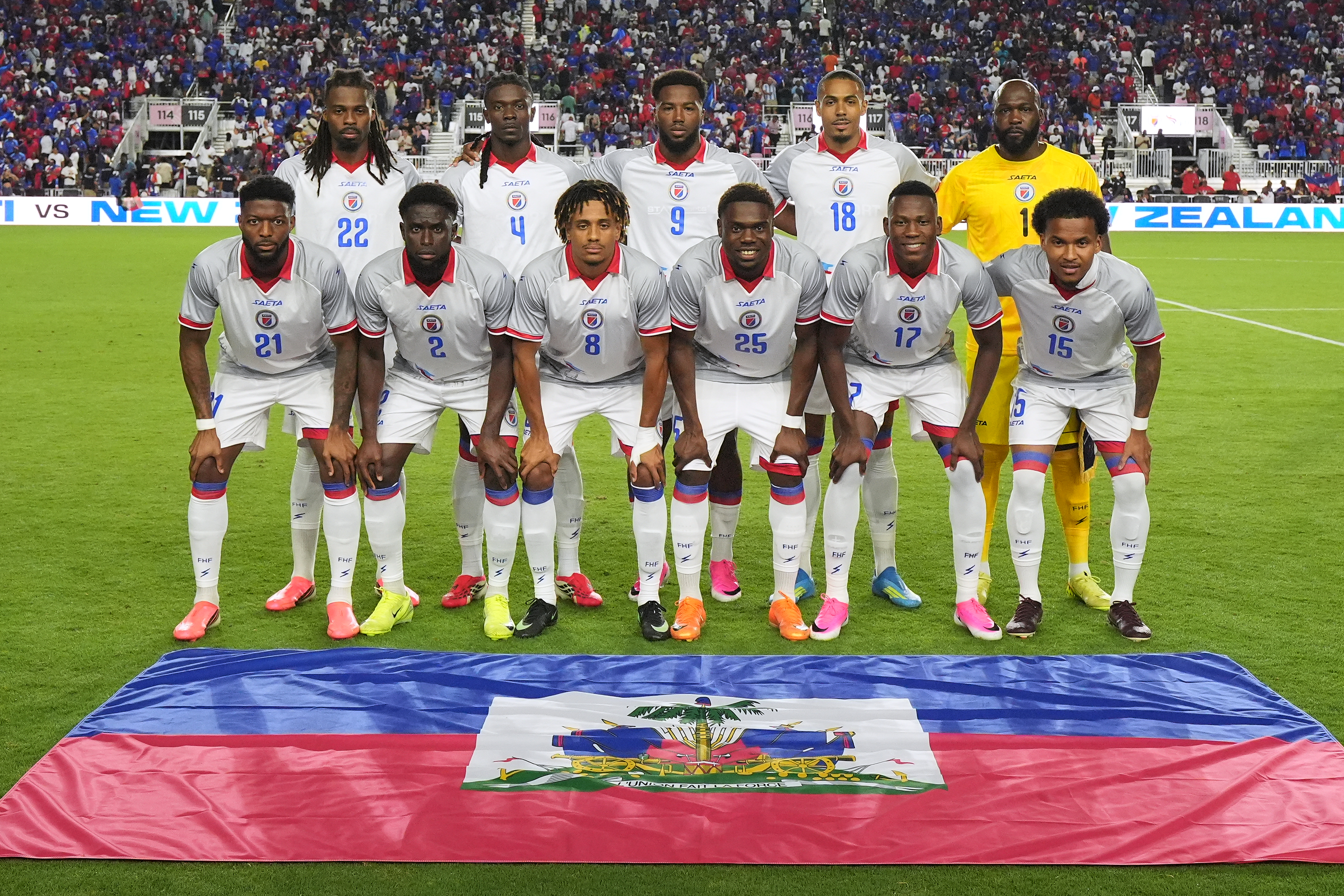Haiti national soccer team players pose for a team picture at the start of an international friendly soccer match against New Zealand, June 2, 2026, in Fort Lauderdale, Fla.