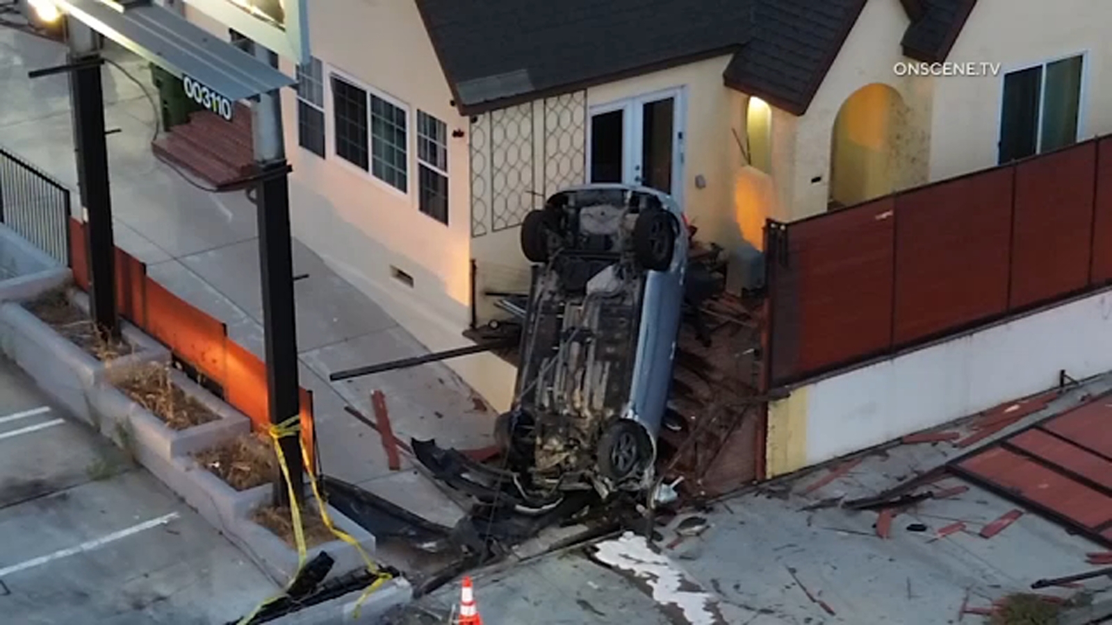 Driver crashes into Wilmington home, flipping vehicle and leaving it standing upright Driver crashes into Wilmington home, flipping vehicle and leaving it standing upright