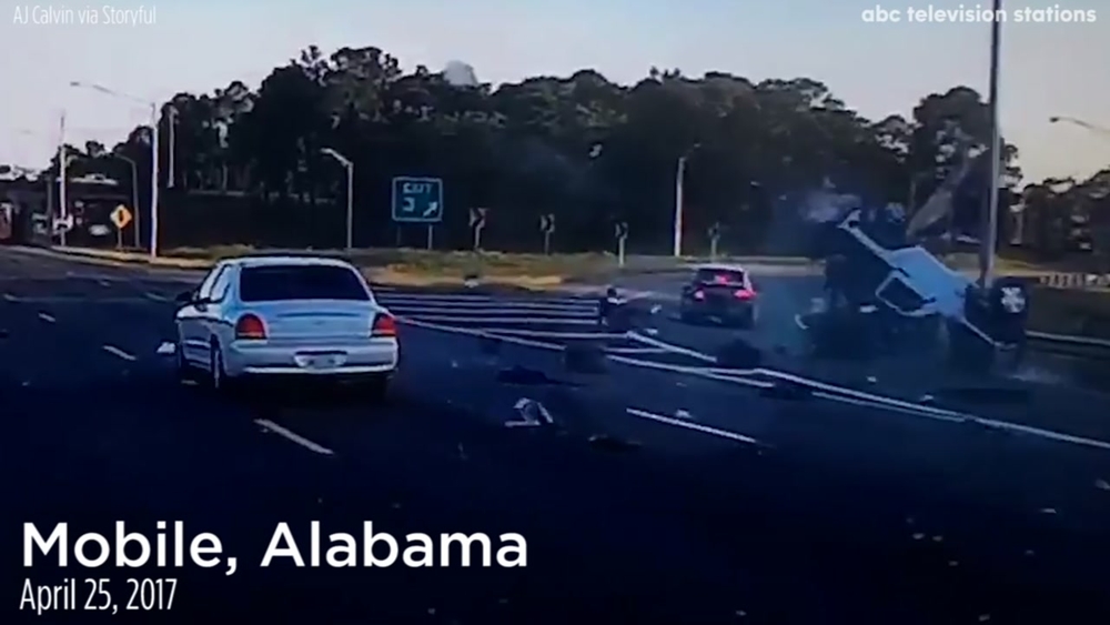 Driver stands up after being ejected in dramatic crash