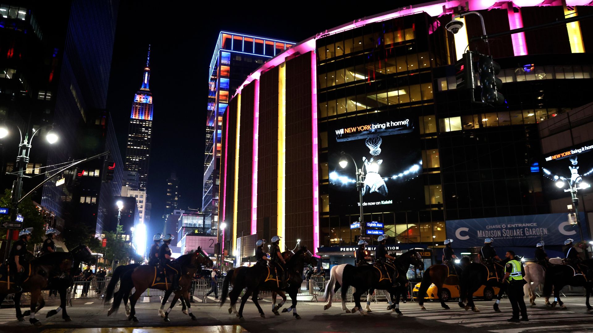 New York City police on horseback patrol the street by Madison Square Garden during Game 5 of the NBA Finals (AP Photo/Heather Khalifa)
