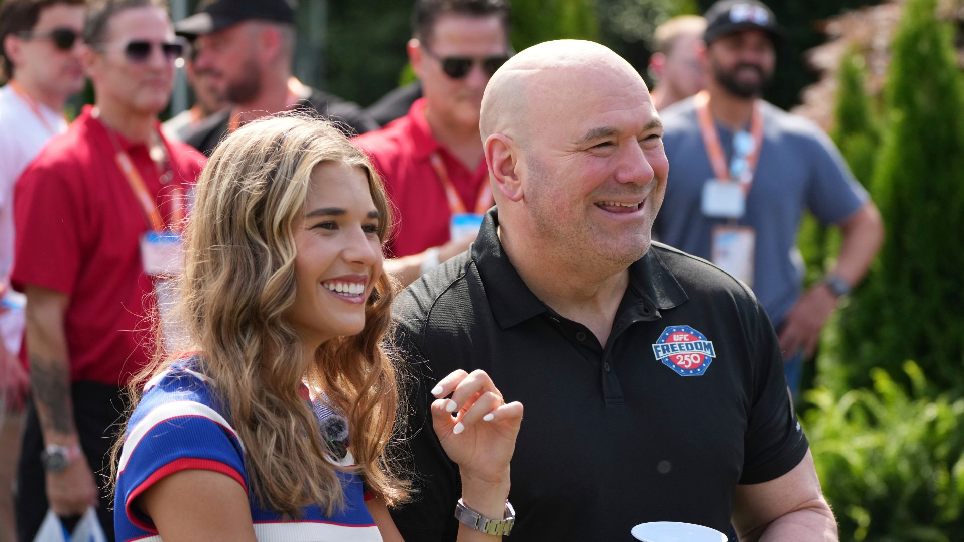 Kai Trump and UFC President and CEO Dana White watch a Motorsports stunt performer do motorcycle jump ahead of the UFC Freedom 250 fights at the White House, Saturday, June 13.