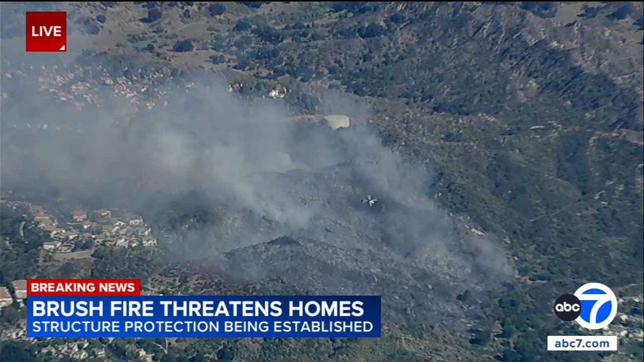 Stevenson Ranch brush fire forces evacuations as flames threaten homes