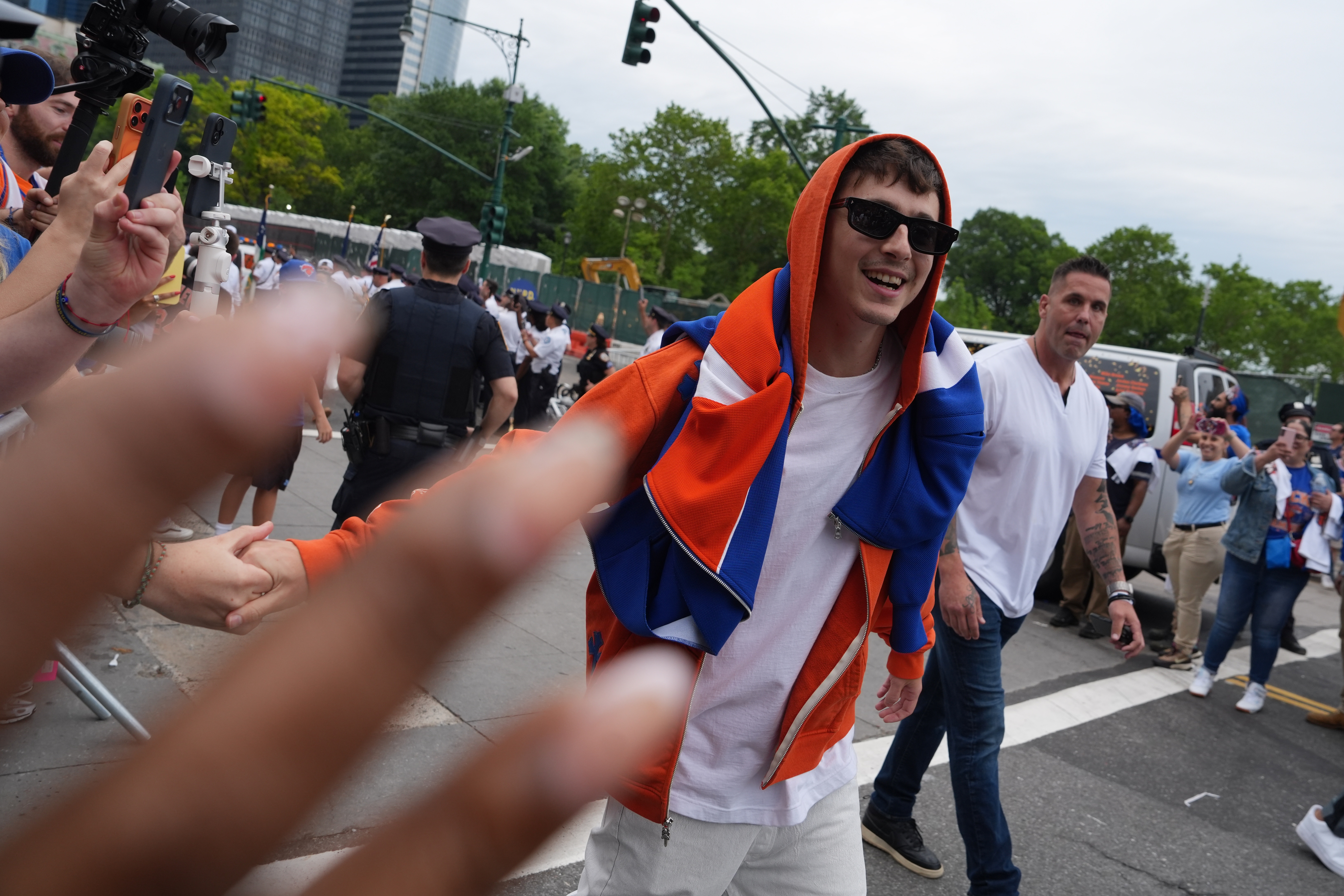 Timothee Chalamet greets fans during the New York Knicks' NBA championship parade Thursday, June 18, 2026, in New York.